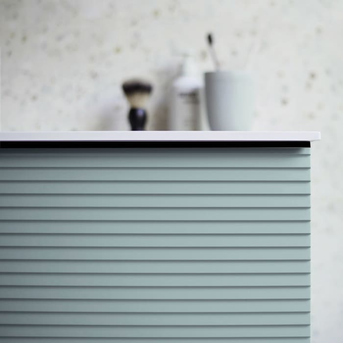 burgbad Fiumo Mineralguss-Waschtisch mit Unterschrank 102 cm, mit Griff G0200, oben mit Plissée-Struktur