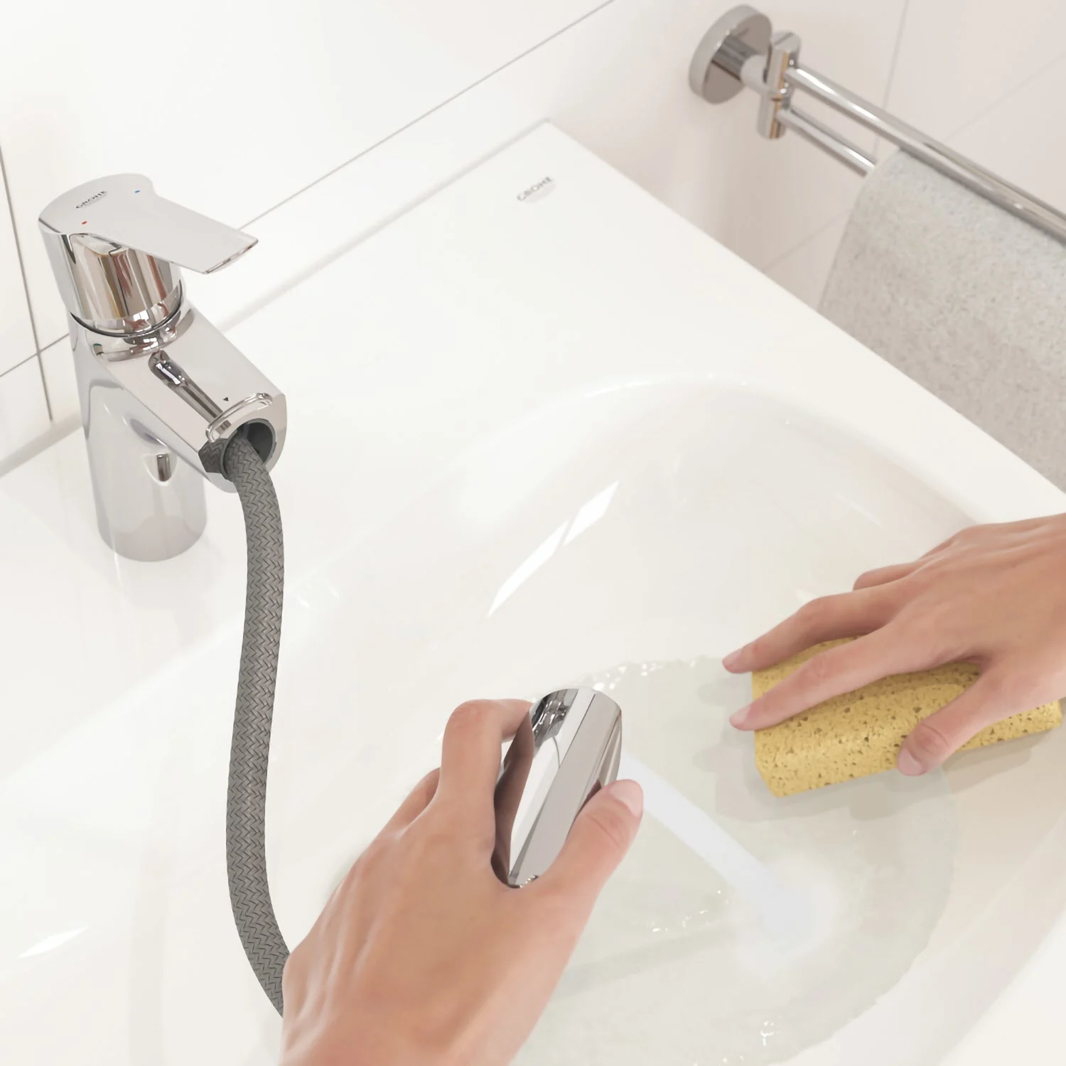 Ręce czyszczące zlew z baterią, Grohe