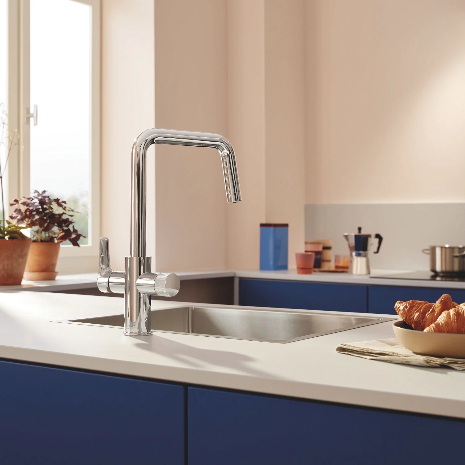 Bateria kuchenna z rogalikami w nowoczesnej kuchni, Grohe