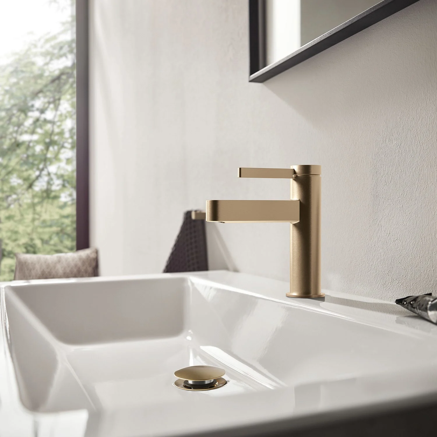 Złota bateria umywalkowa w łazience, hansgrohe