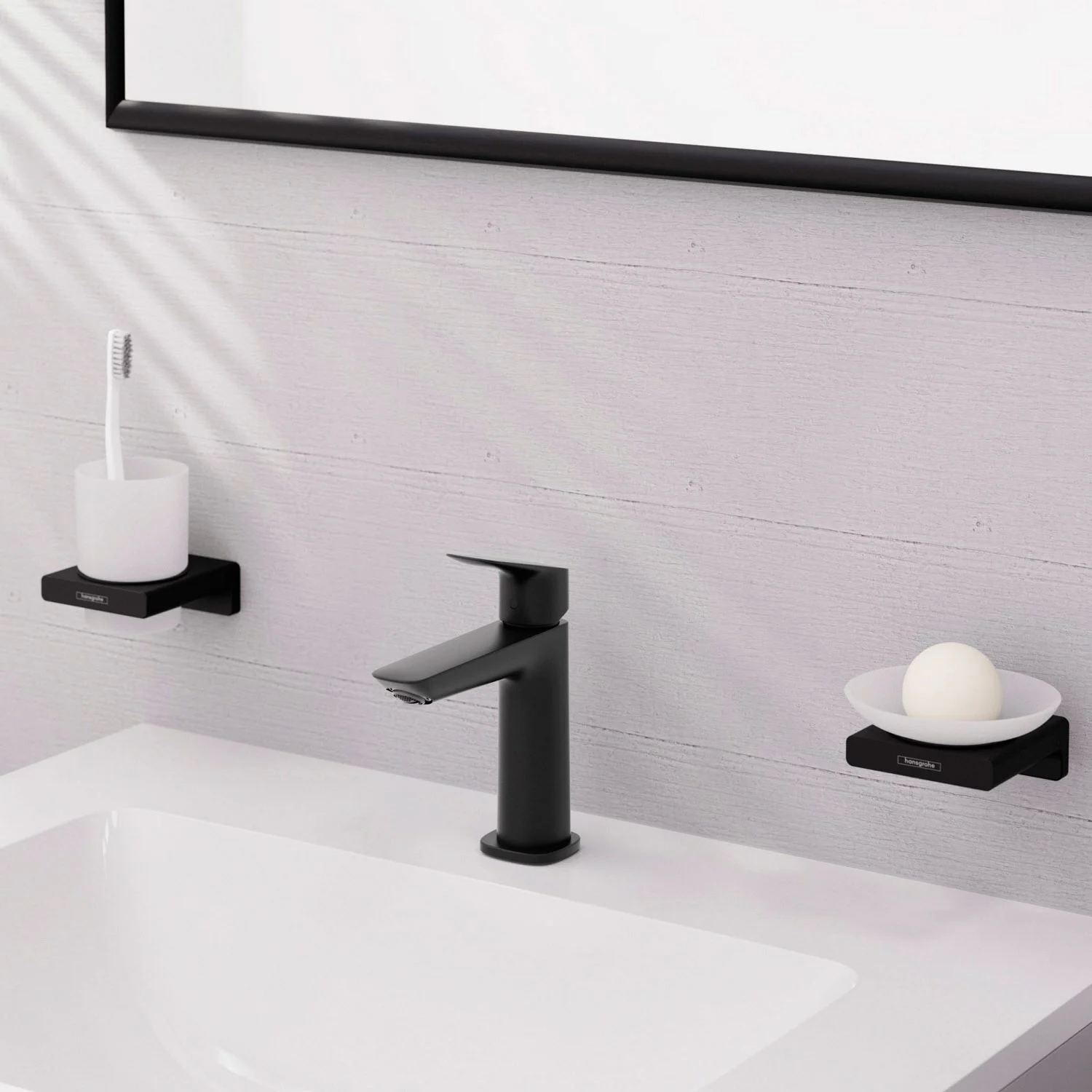 Czarna bateria umywalkowa z uchwytem na szczoteczki i mydelniczką, hansgrohe