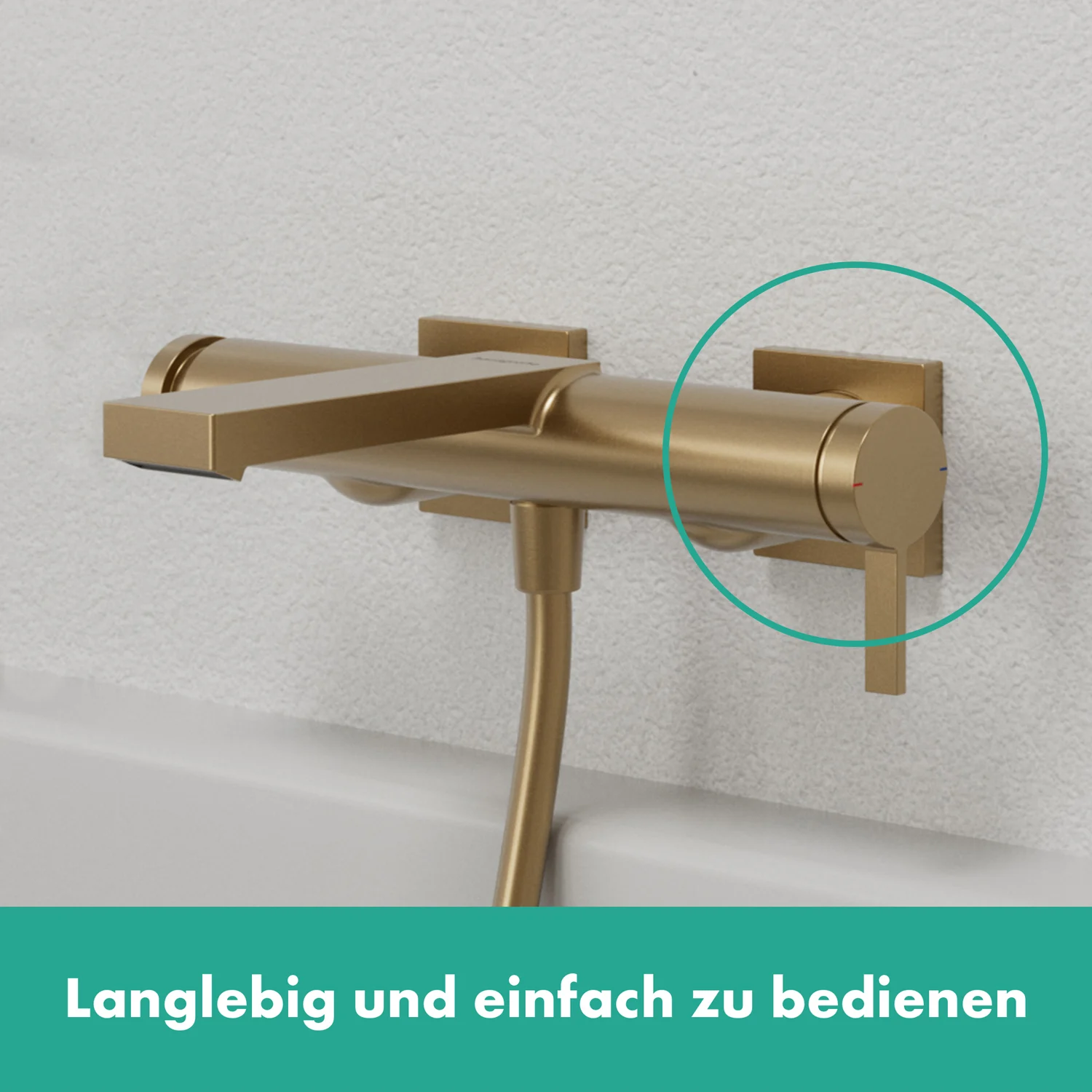 Złoty kran wannowy zamontowany na ścianie, hansgrohe