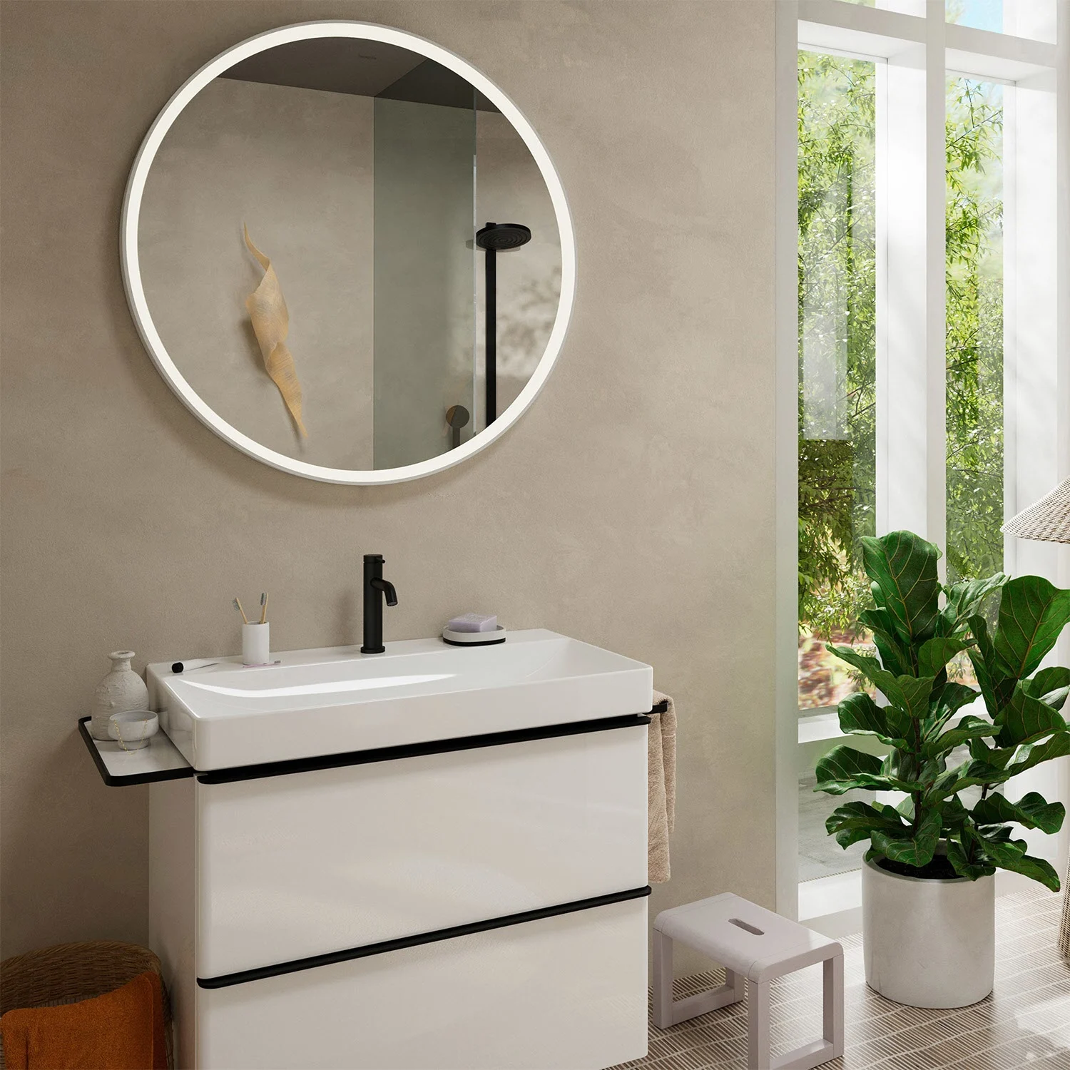 Łazienka z okrągłym lustrem i umywalką, hansgrohe