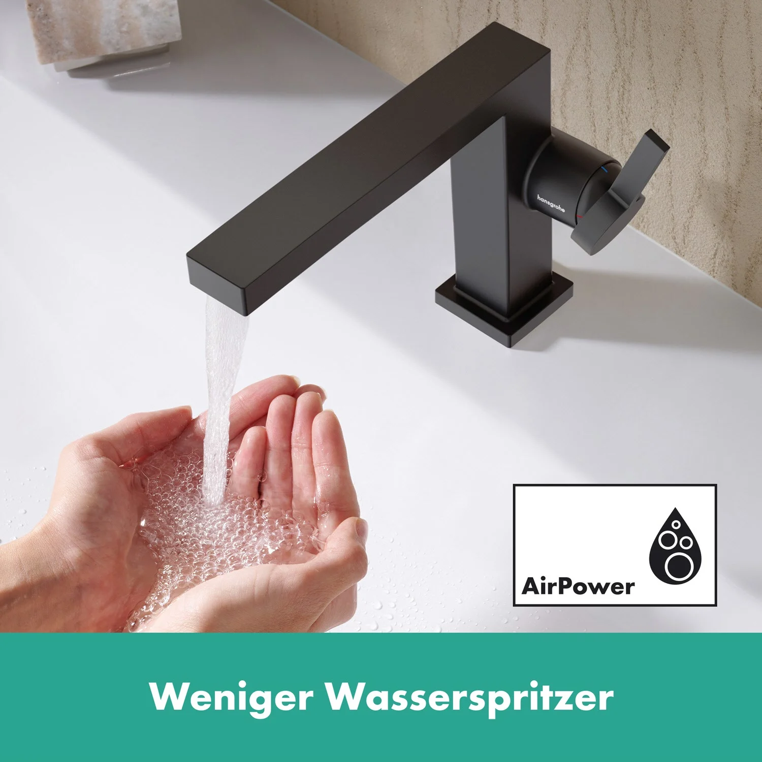 Czarna bateria z strumieniem wody na dłonie, hansgrohe