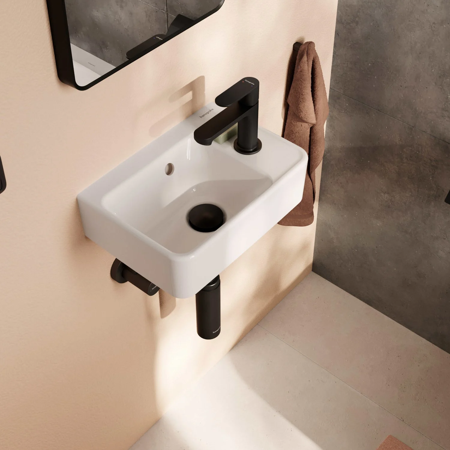 Mała umywalka z czarną baterią, hansgrohe