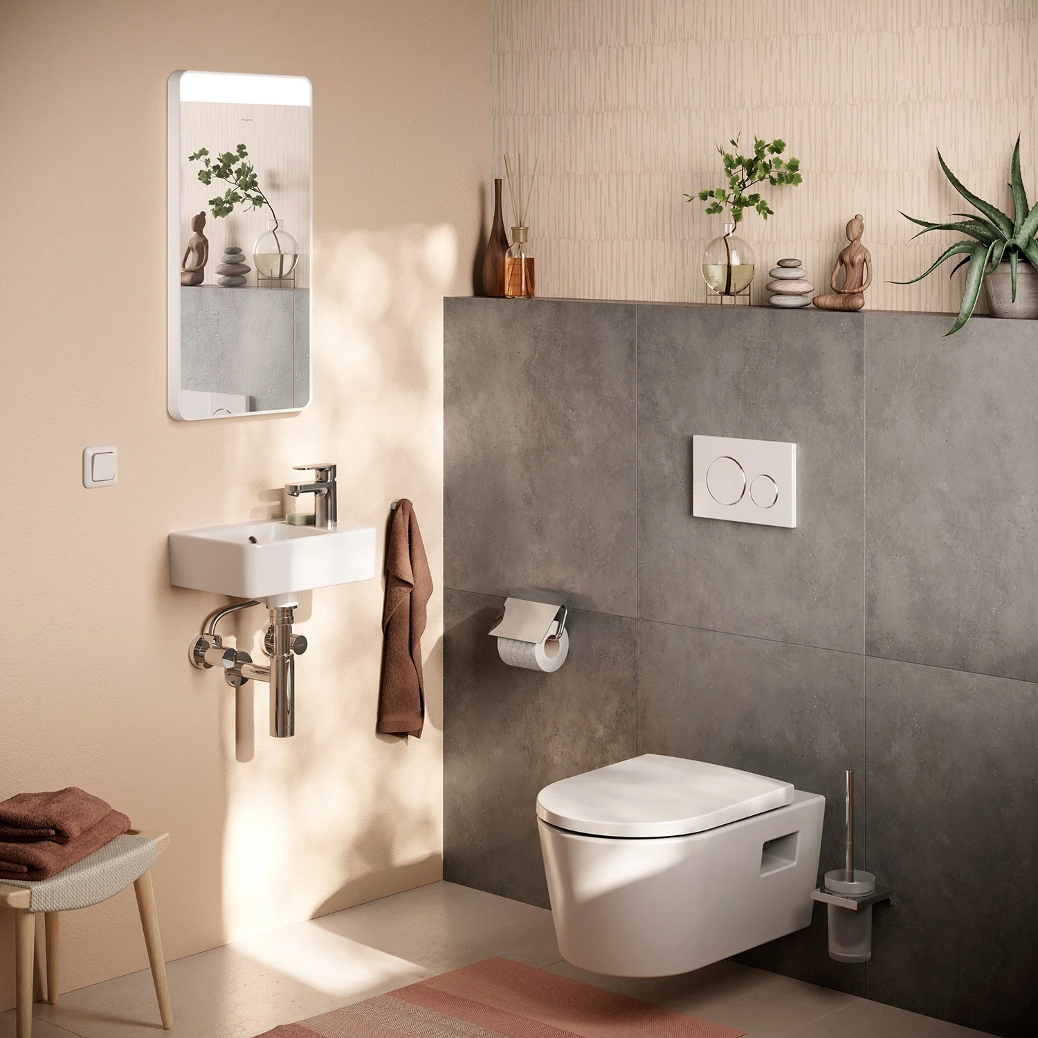 Łazienka z małą umywalką i toaletą, hansgrohe