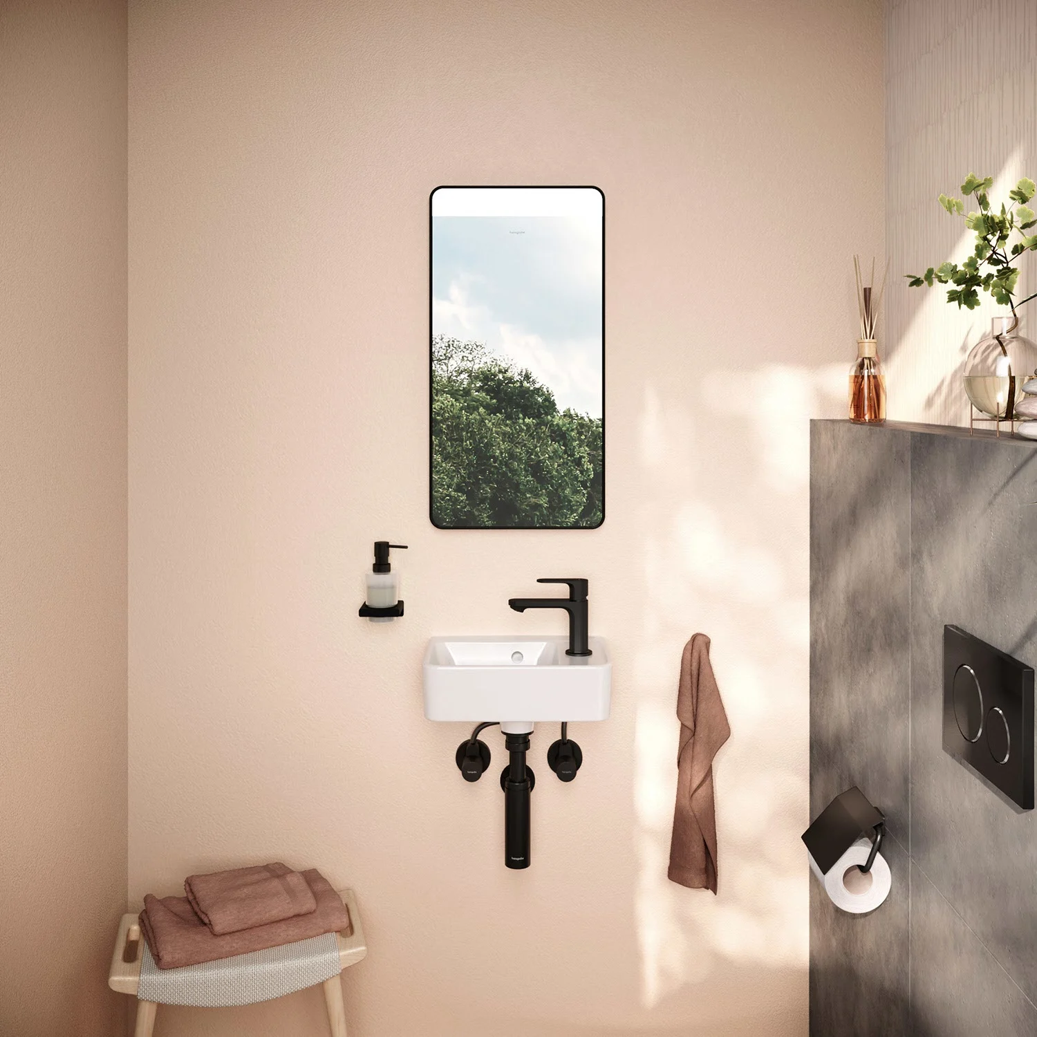 Mała umywalka z lustrem w łazience, hansgrohe