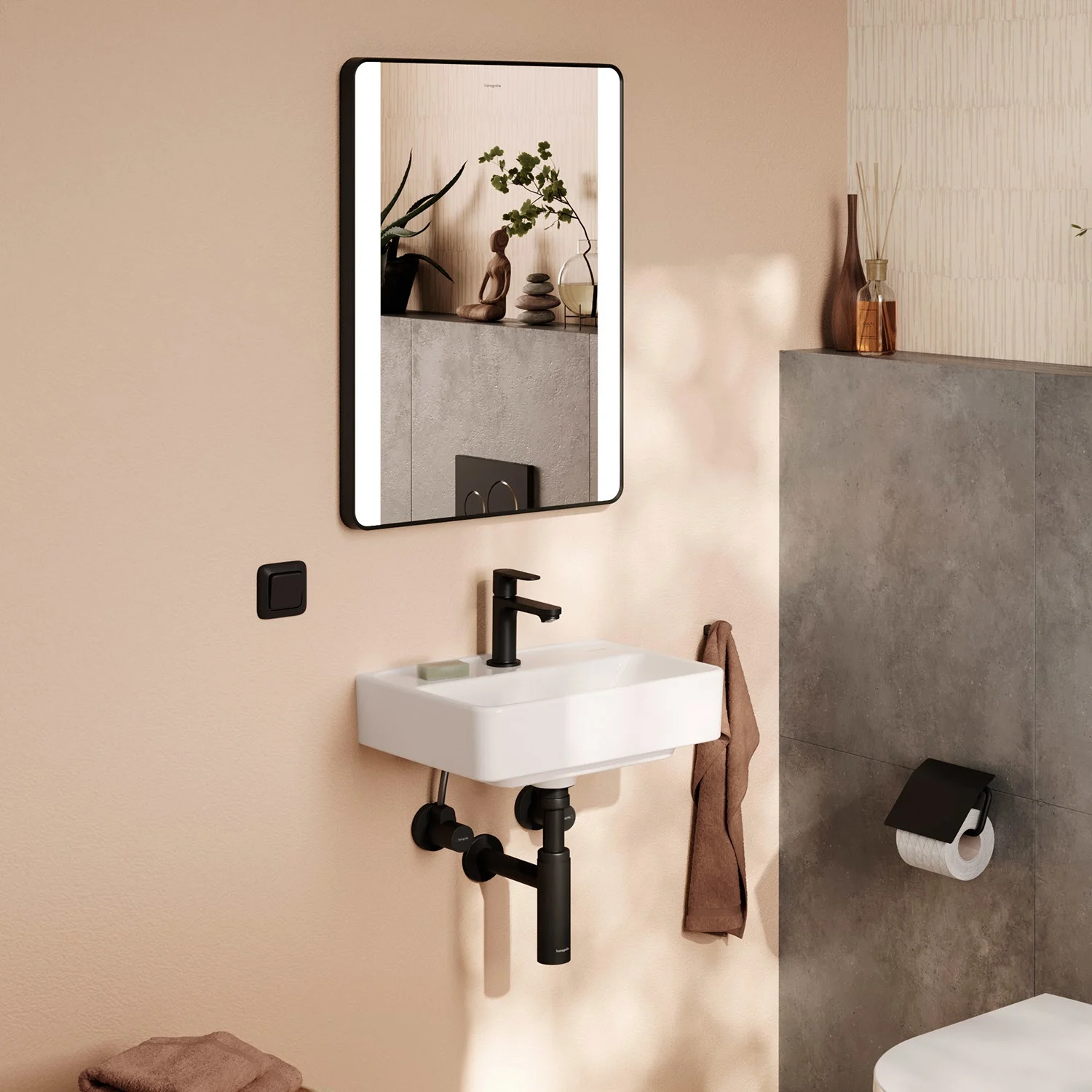 Mała umywalka z lustrem w łazience, hansgrohe