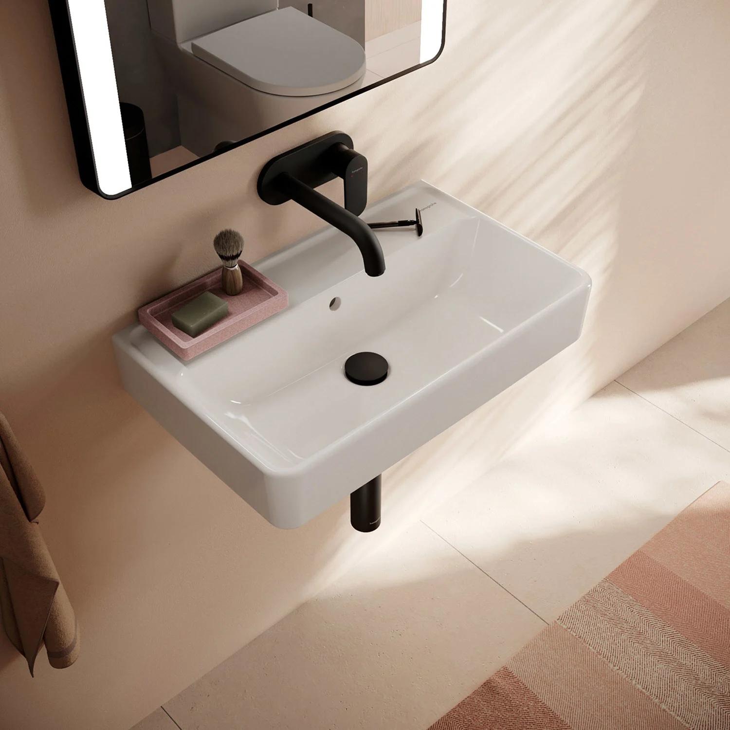 Umywalka z czarną baterią w zbliżeniu, hansgrohe