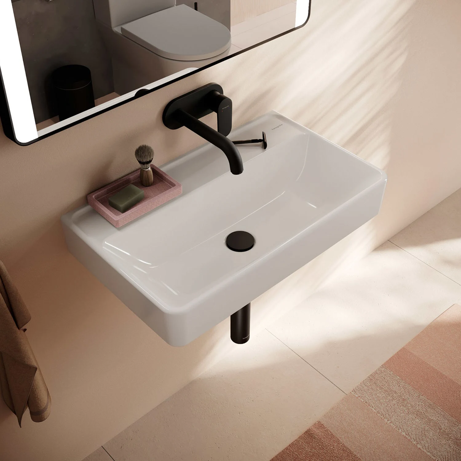 Umywalka z czarną baterią w zbliżeniu, hansgrohe