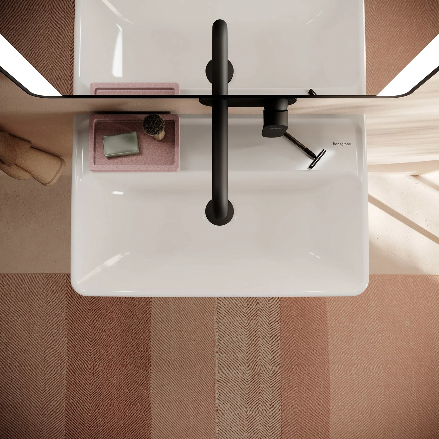 Umywalka z czarną baterią widziana z góry, hansgrohe
