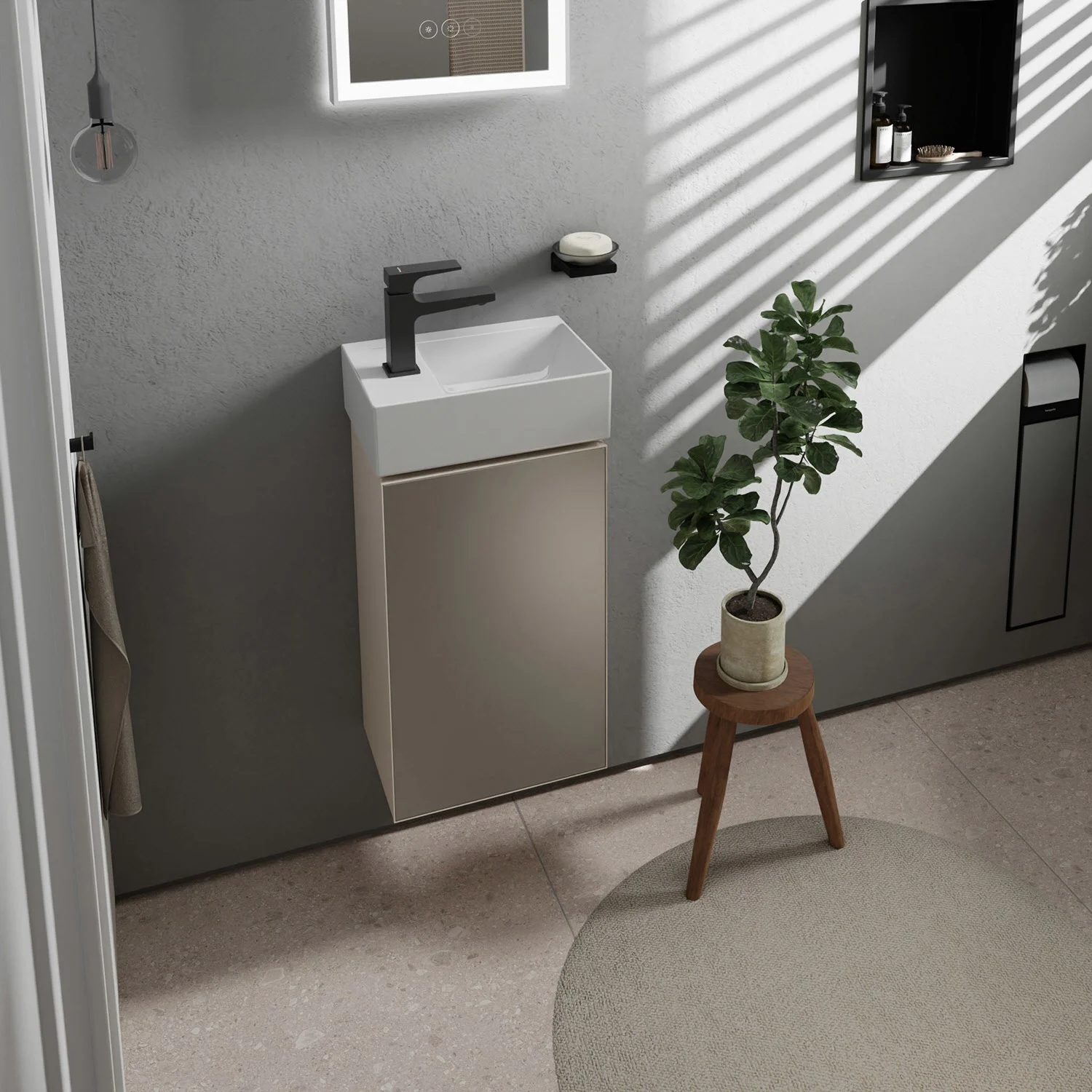 Mała umywalka z ręcznikiem i rośliną, hansgrohe