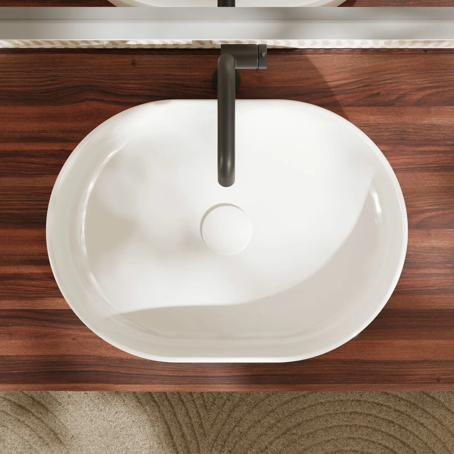 Owalna umywalka na drewnianej powierzchni z góry, hansgrohe