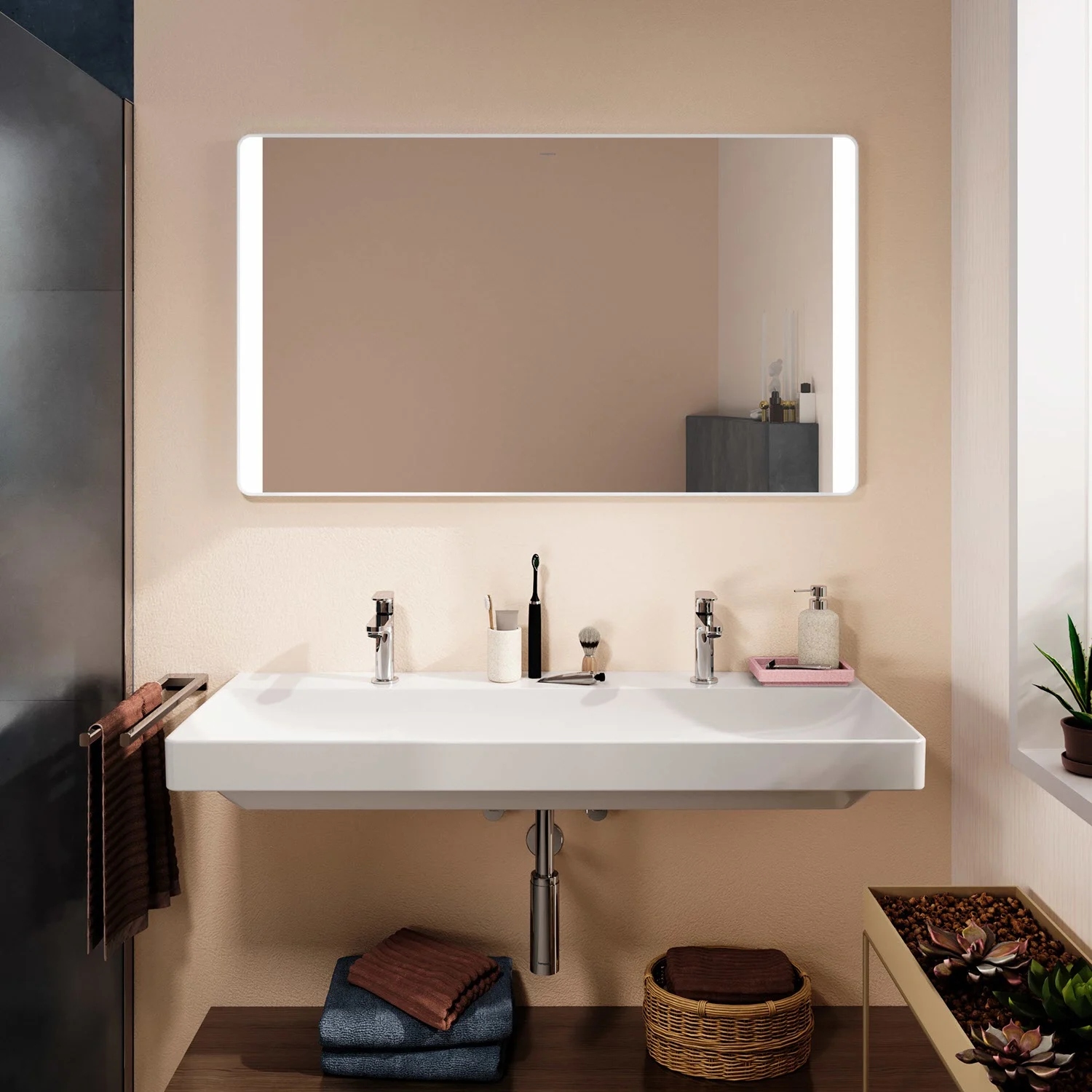 Prostokątne lustro nad podwójną umywalką w łazience, hansgrohe