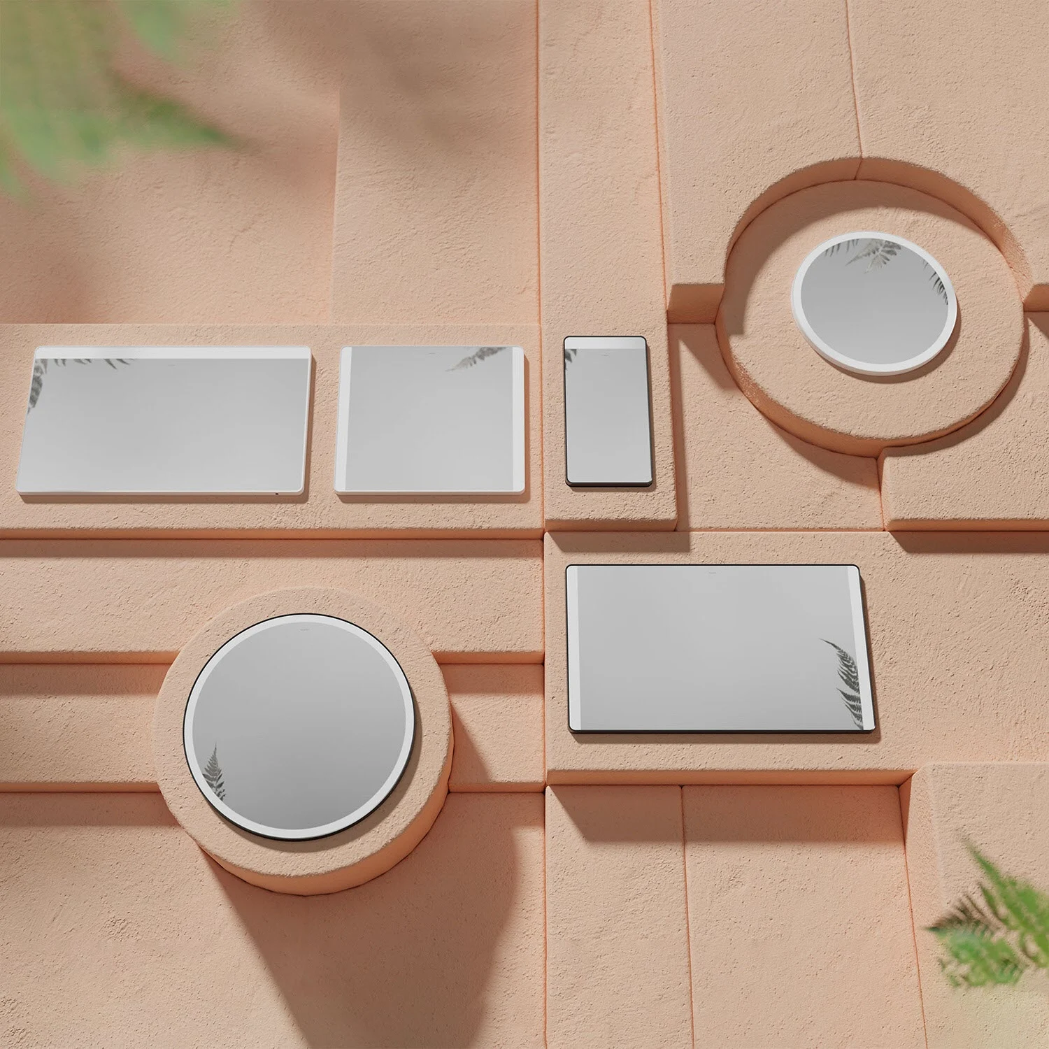 Różne lustra na teksturowanej ścianie, hansgrohe