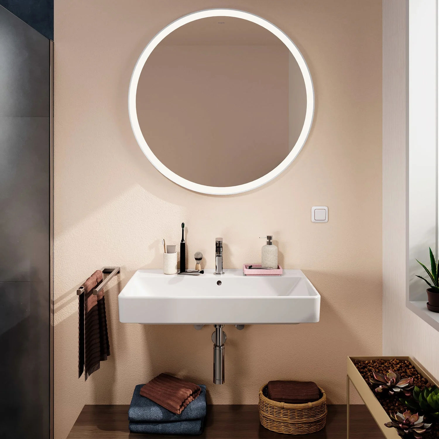 Umywalka z okrągłym lustrem w łazience, hansgrohe