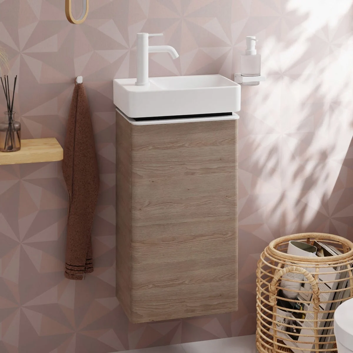 Szafka pod umywalkę z białą umywalką i uchwytem na ręczniki, hansgrohe