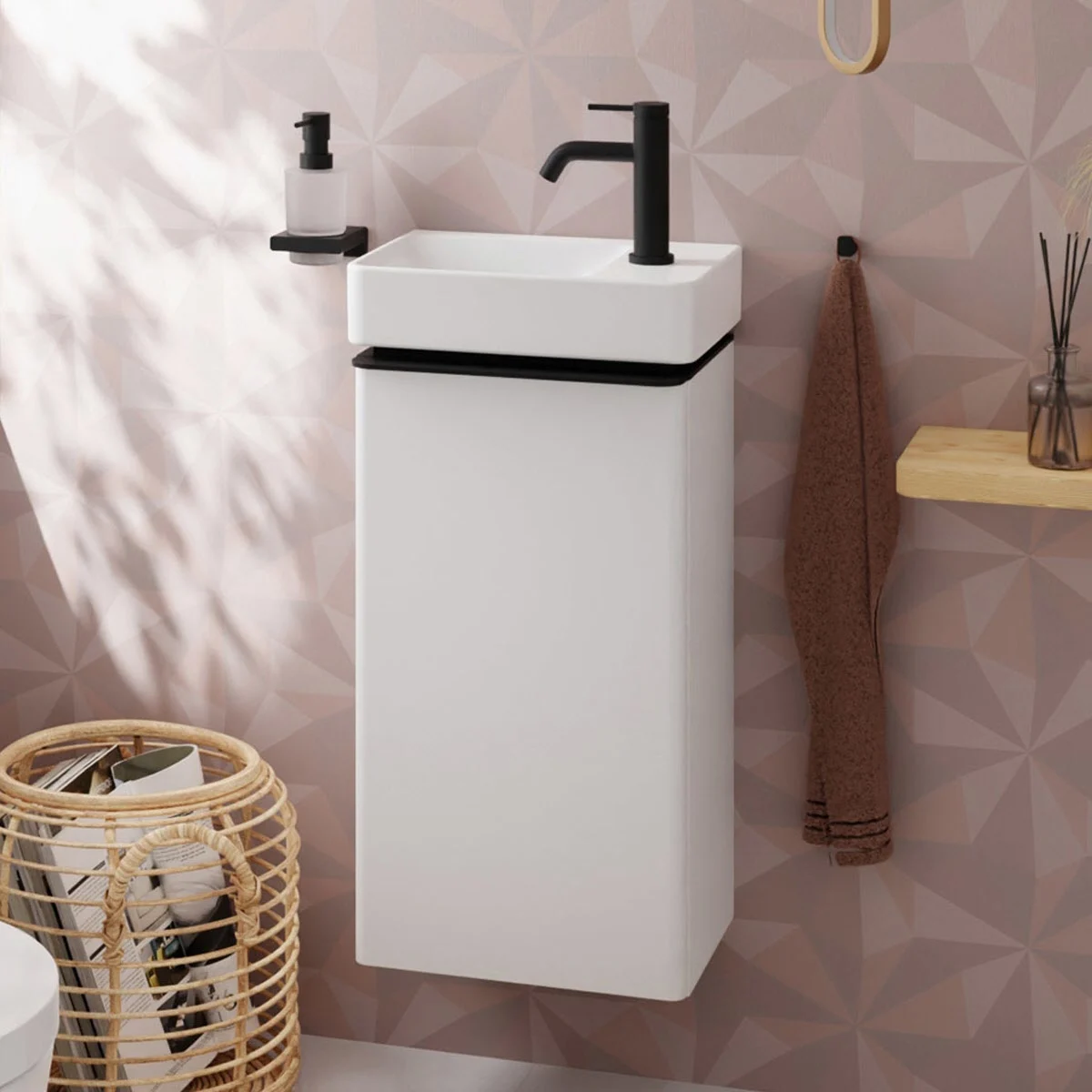 Biała szafka pod umywalkę z czarną baterią w łazience, hansgrohe