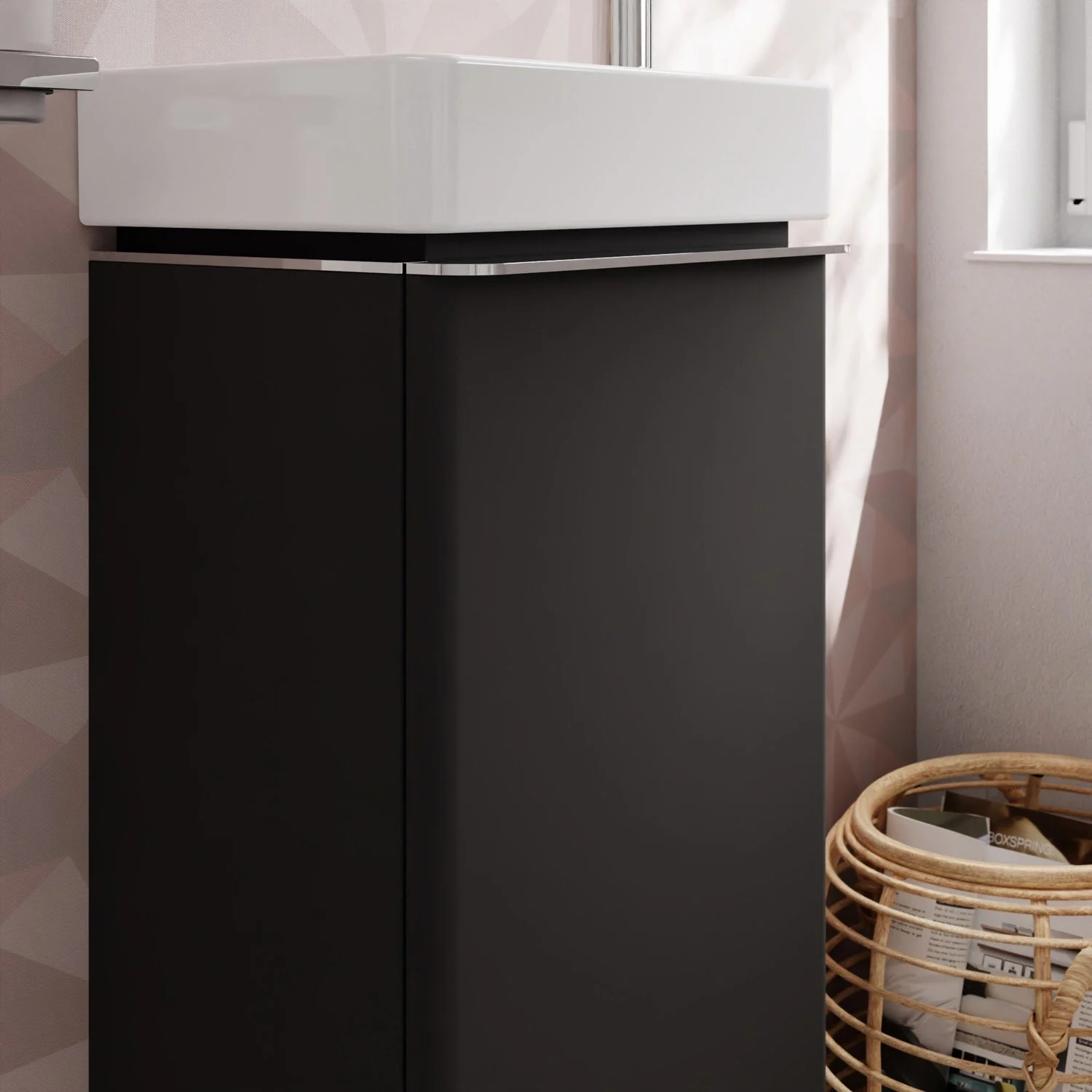 Czarna szafka pod umywalkę z metalowym akcentem, hansgrohe