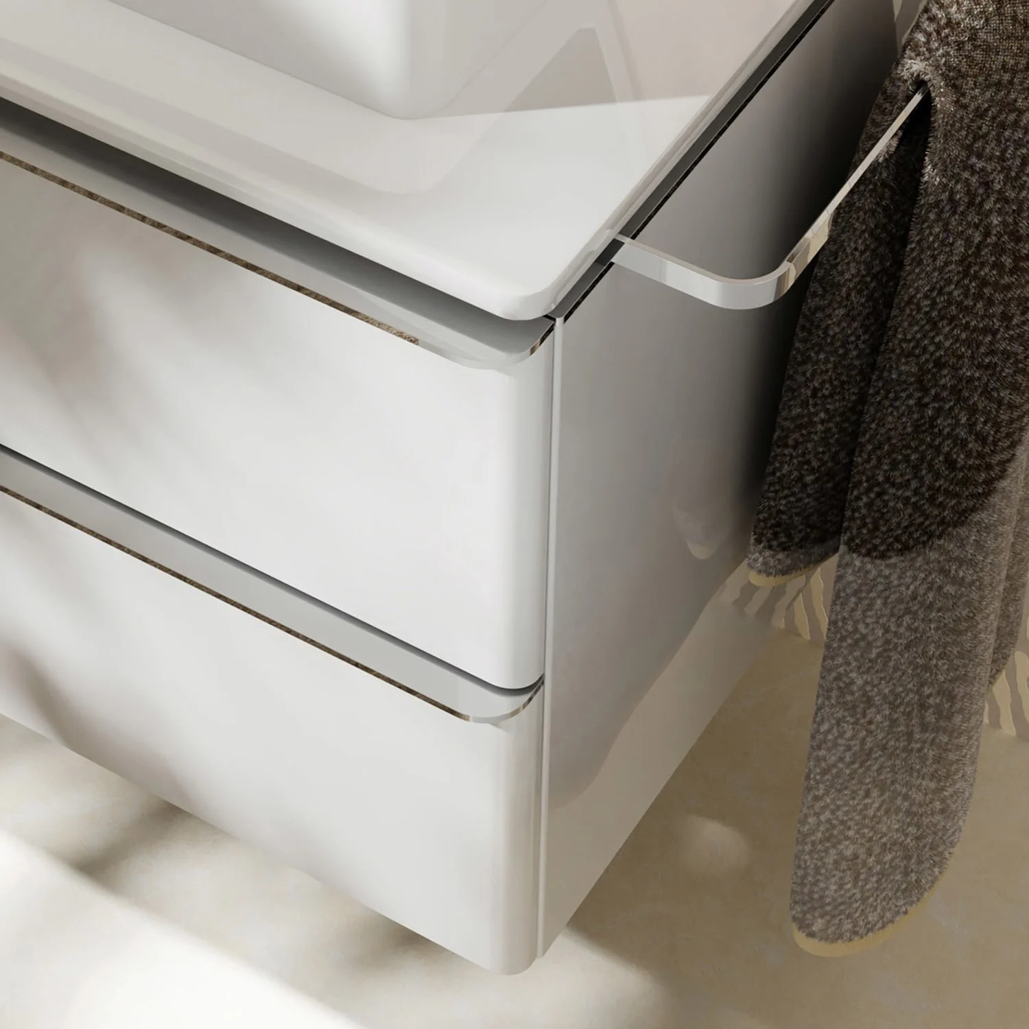 Zbliżenie białej szafki pod umywalkę z ręcznikiem, hansgrohe