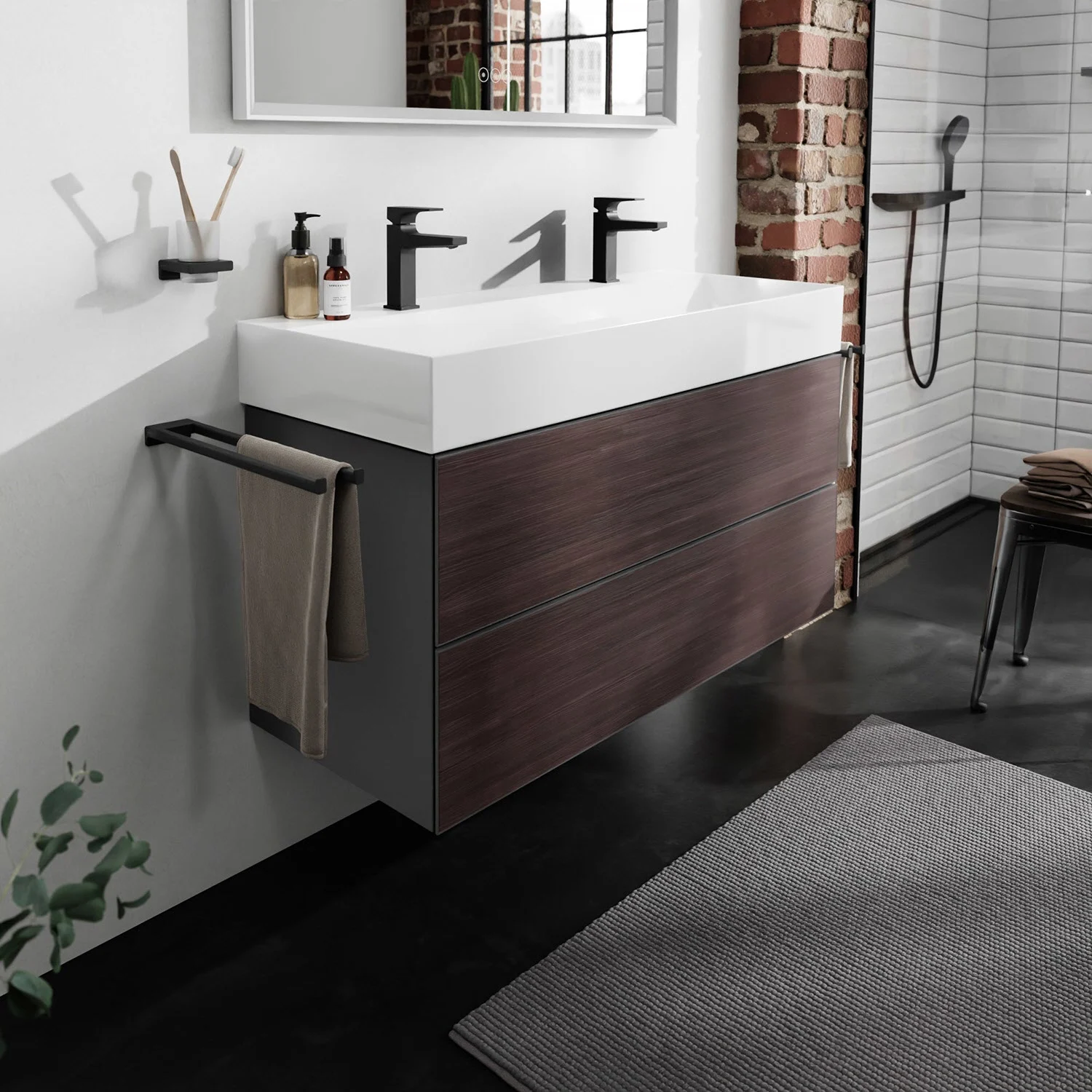 Łazienka z ciemną szafką pod umywalkę i podwójną umywalką, hansgrohe