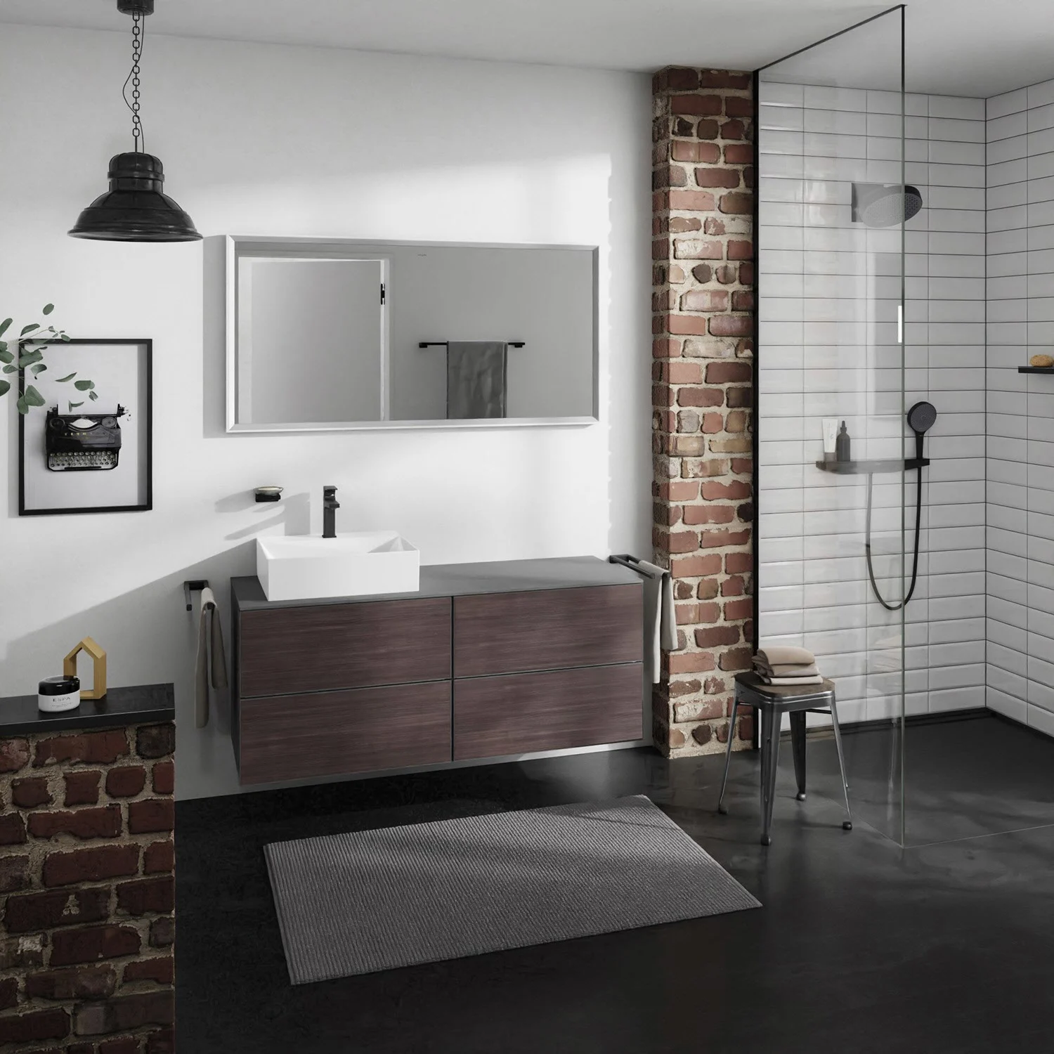 Ciemna szafka pod umywalkę w łazience z ceglaną ścianą, hansgrohe
