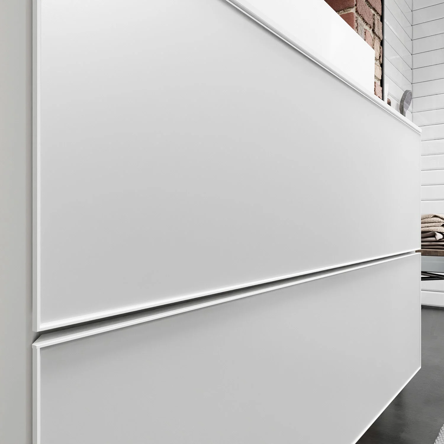 Szafka pod umywalkę w białym kolorze w łazience, hansgrohe