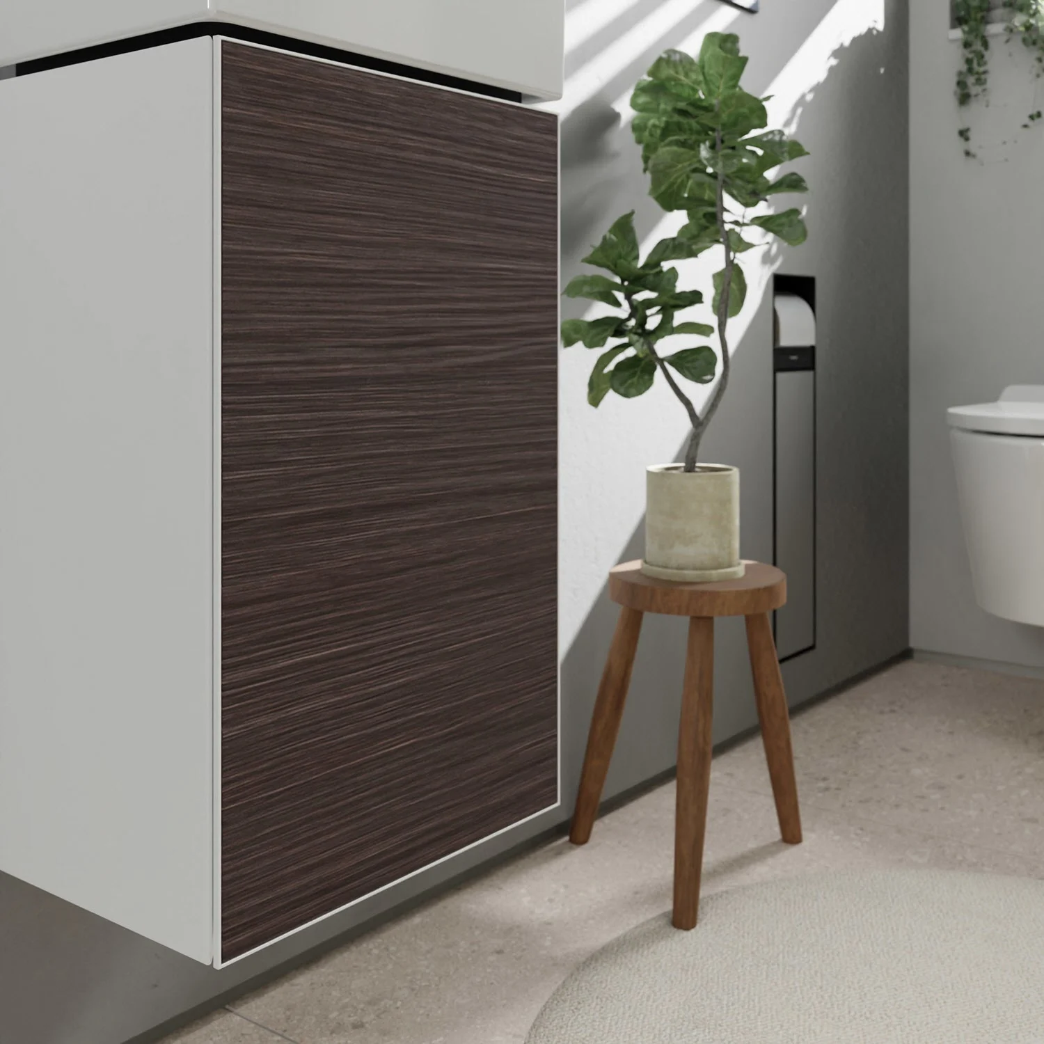 Ciemna szafka pod umywalkę z rośliną w łazience, hansgrohe