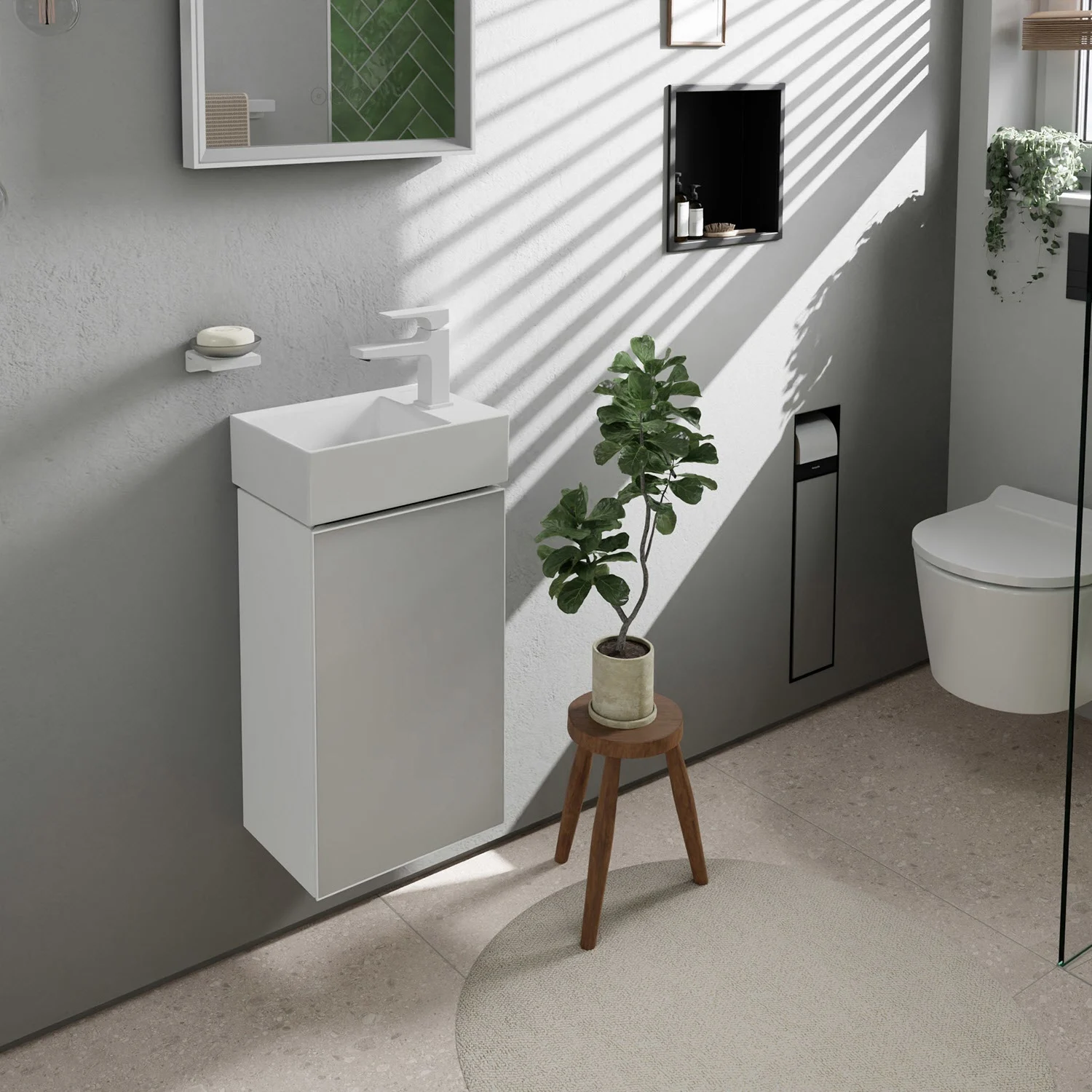 Szafka pod umywalkę w łazience z rośliną, hansgrohe