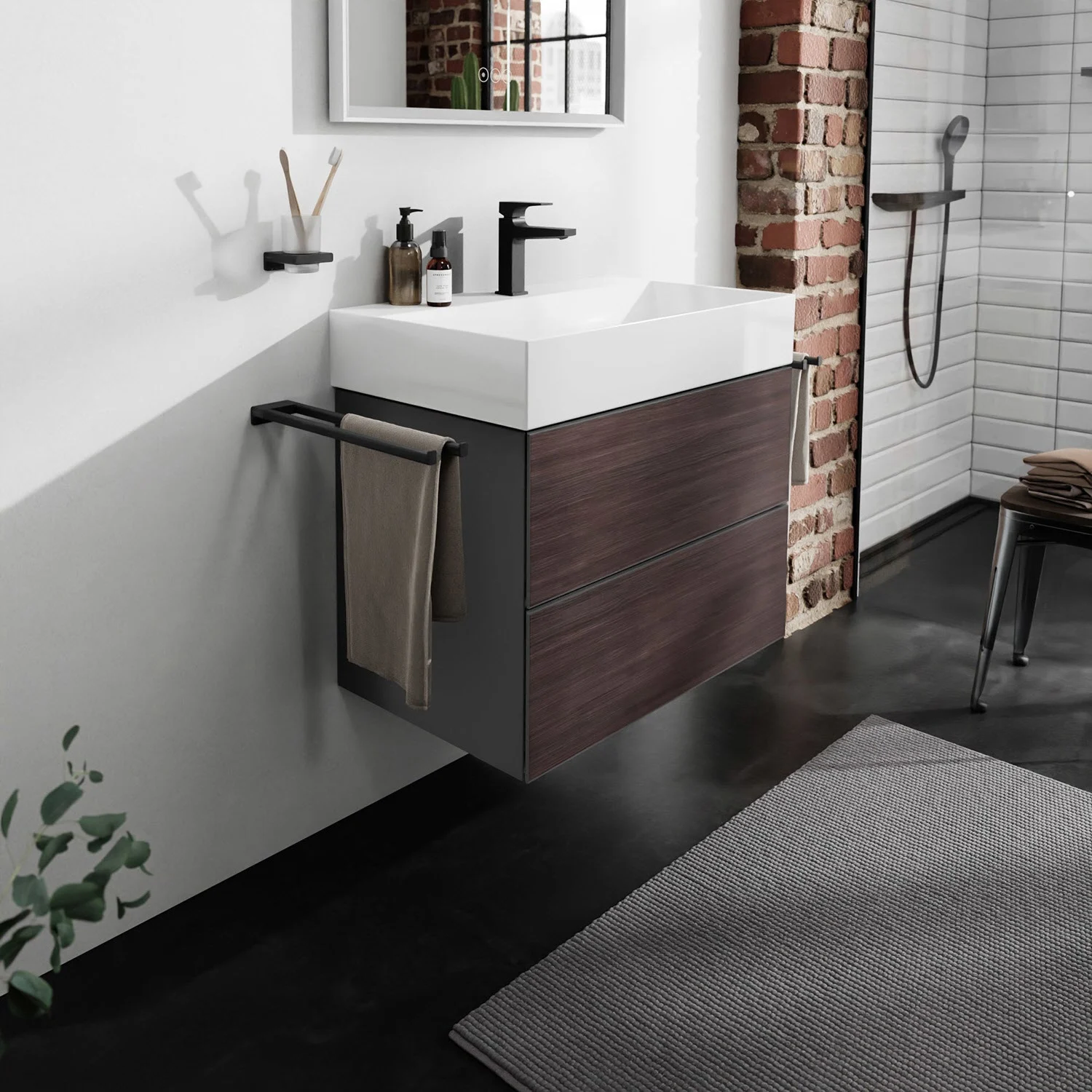 Szafka pod umywalkę w ciemnym drewnie w łazience, hansgrohe