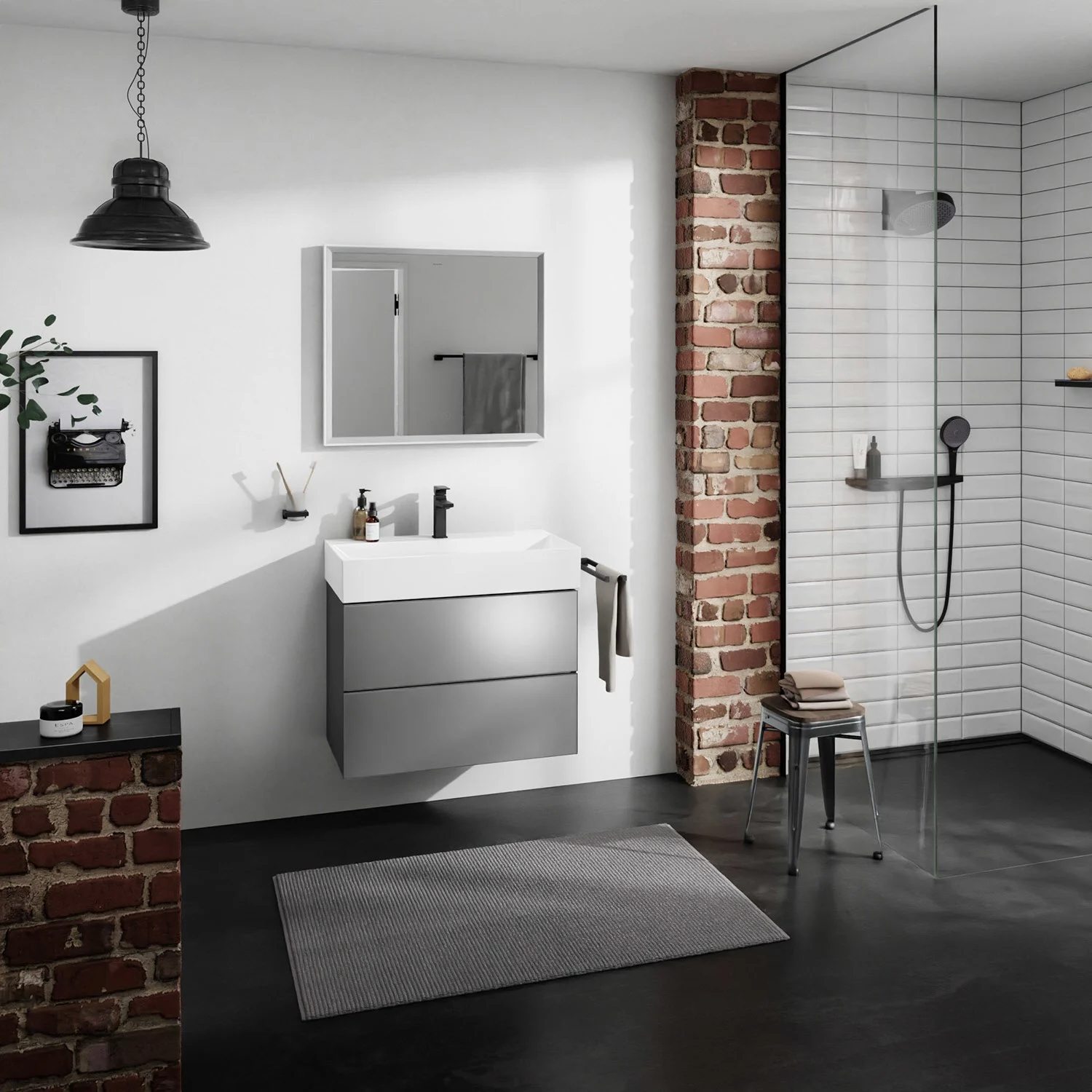 Szara szafka umywalkowa w stylowej łazience, hansgrohe
