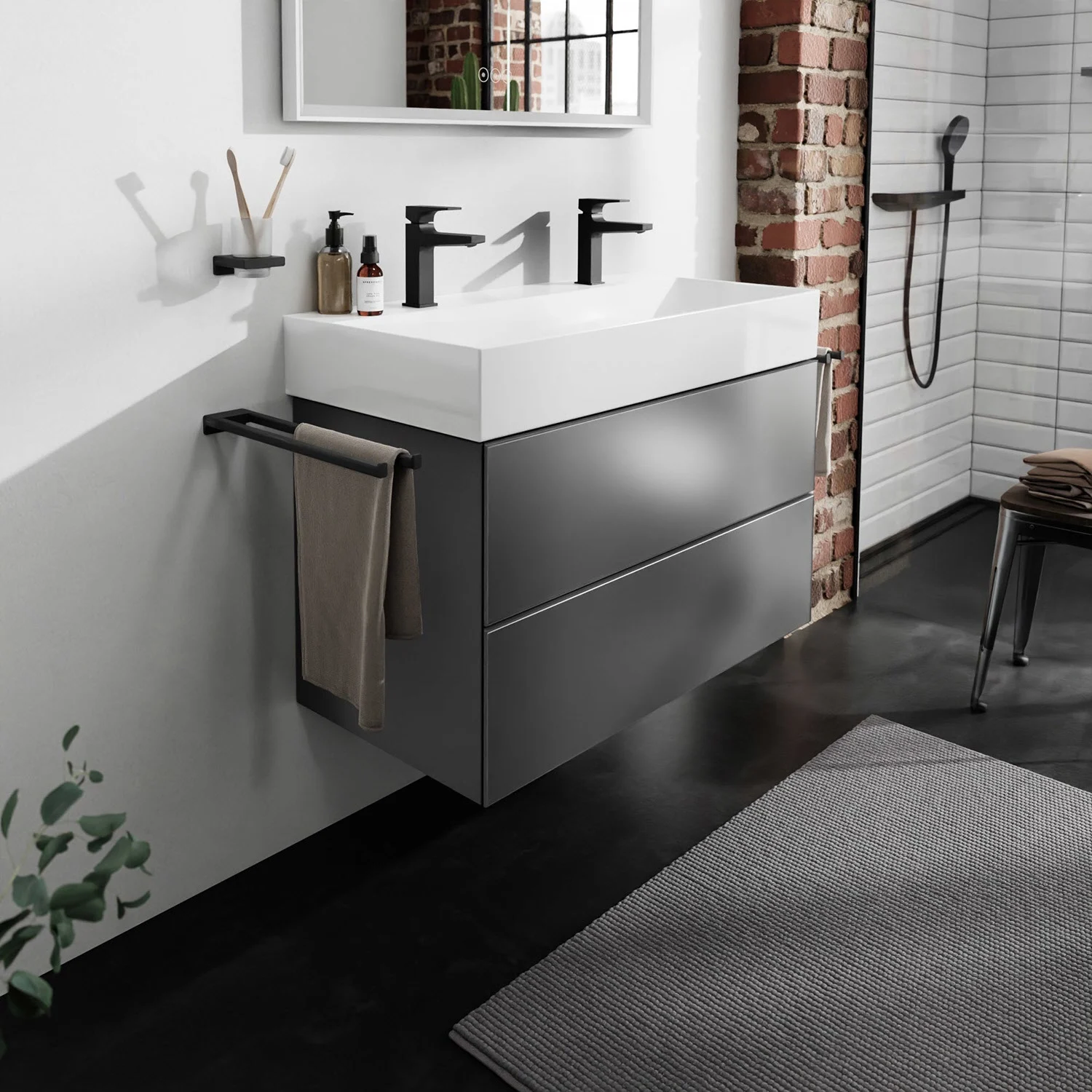 Szara szafka pod umywalkę w nowoczesnej łazience, hansgrohe