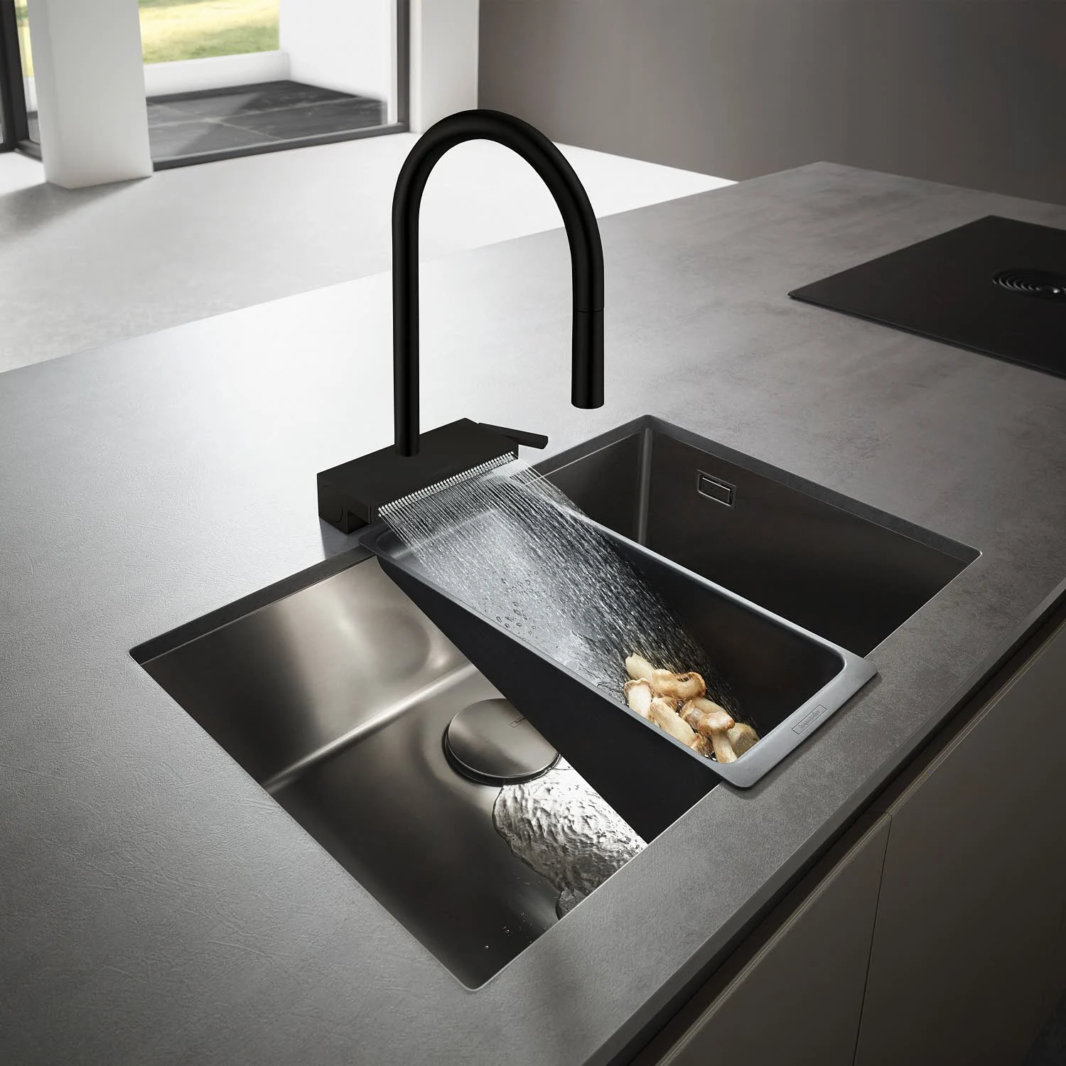 Czarna bateria kuchenna z strumieniem wody w zlewie, hansgrohe