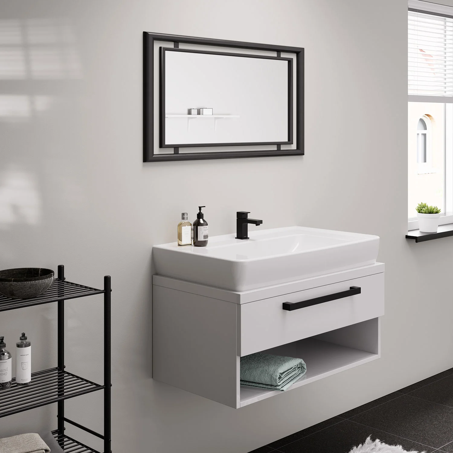 Umywalka z czarnym zaworem stojącym i lustrem, hansgrohe