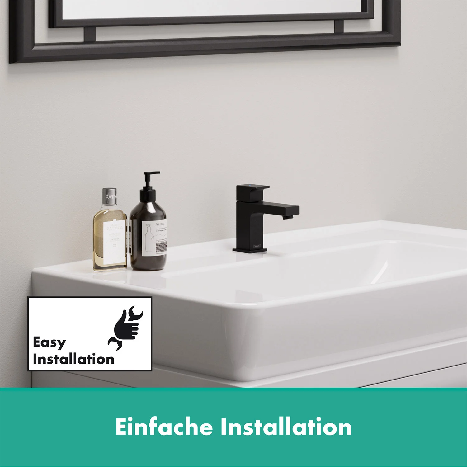Umywalka z czarnym zaworem stojącym i akcesoriami, hansgrohe