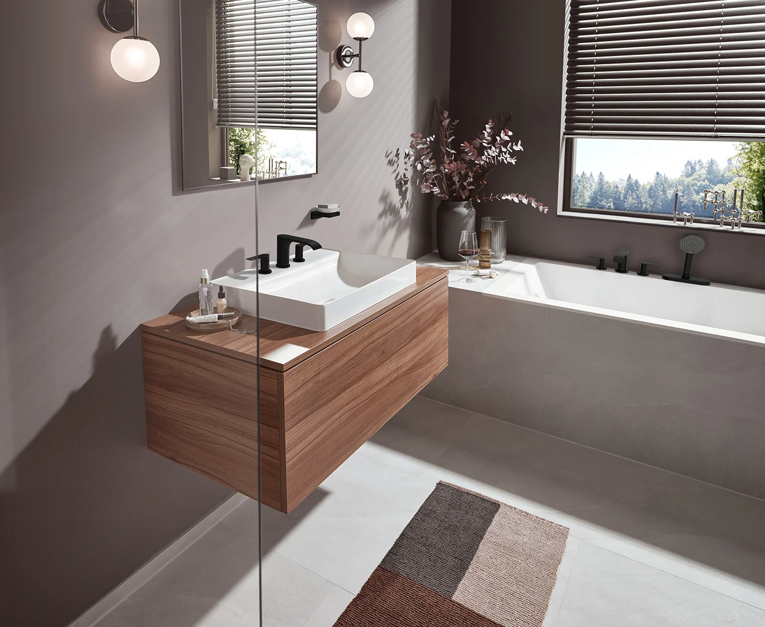 Nowoczesna łazienka z umywalką i wanną, hansgrohe