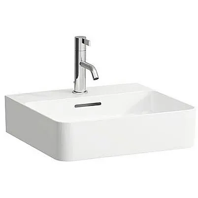 Biała umywalka z baterią na białym tle, Laufen