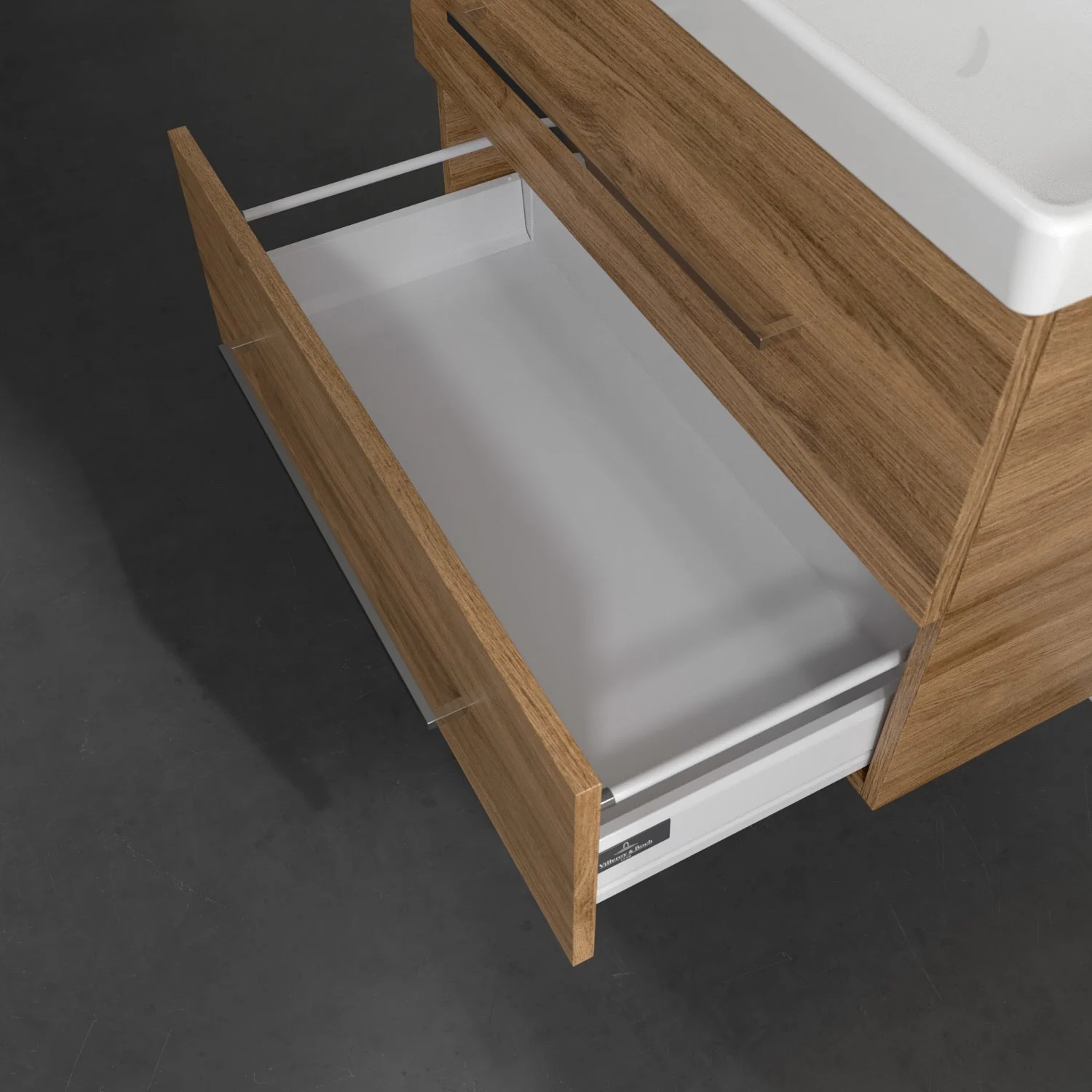 Szafka pod umywalkę w ciemnym drewnianym wyglądzie z otwartą szufladą, Villeroy & Boch