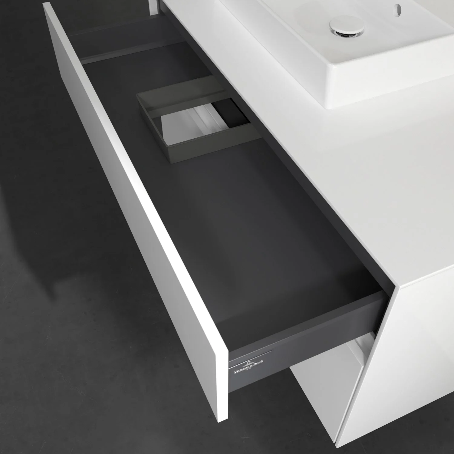 Biała szafka pod umywalkę z otwartą szufladą, Villeroy & Boch