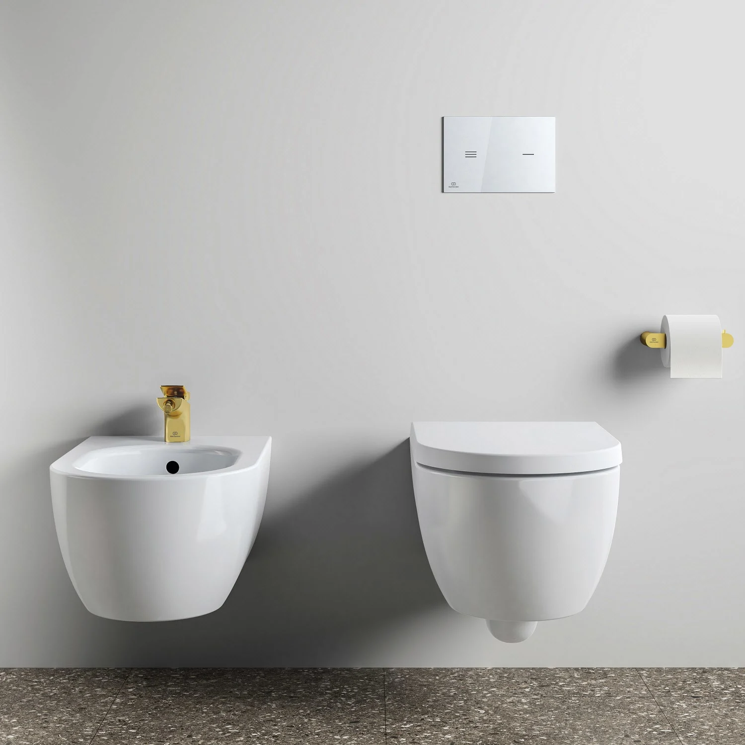 Toaleta i bidet ze złotym uchwytem na papier, Ideal Standard