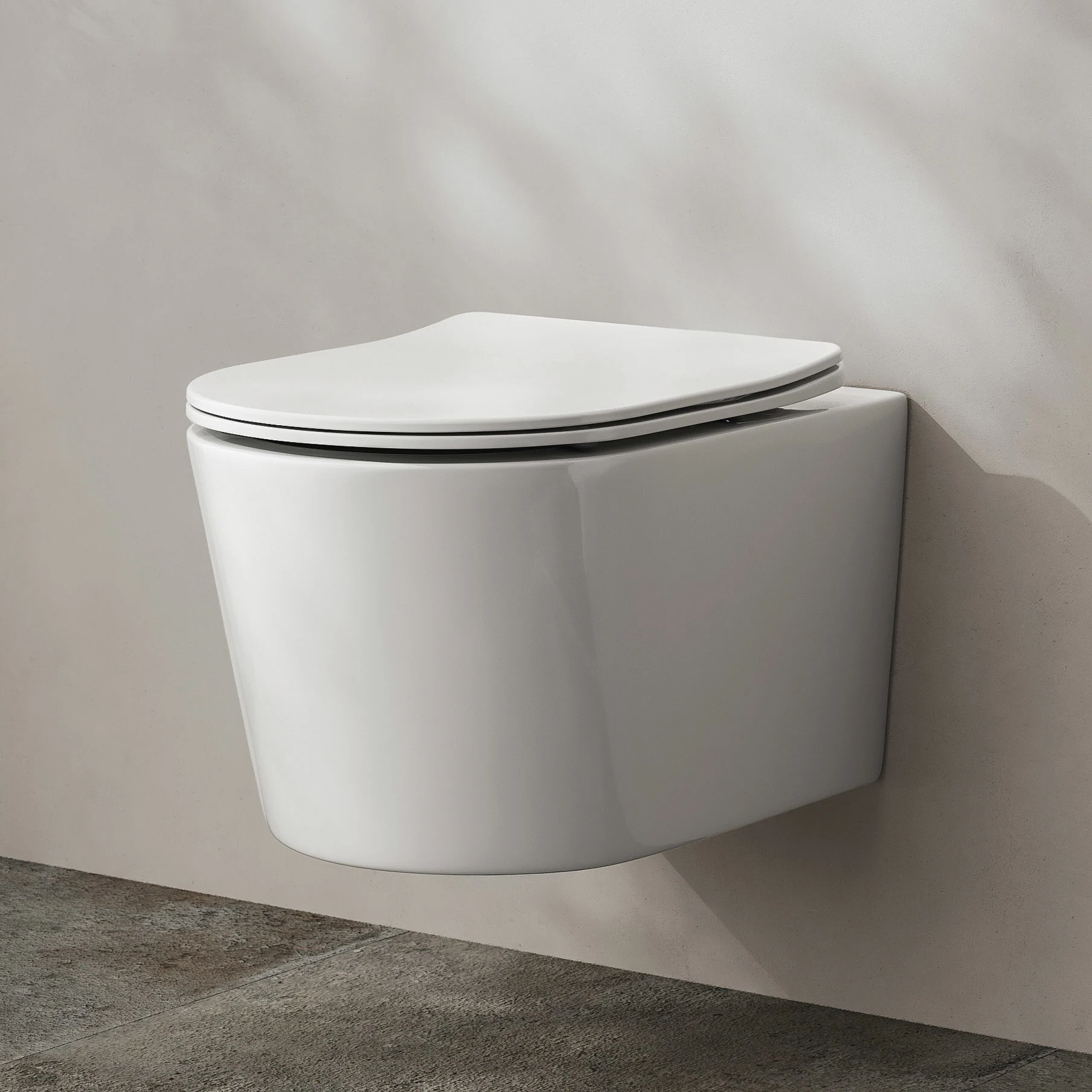 Kronenbach Tube Wand-WC spülrandlos mit Rotationsspülung und WC-Sitz slim