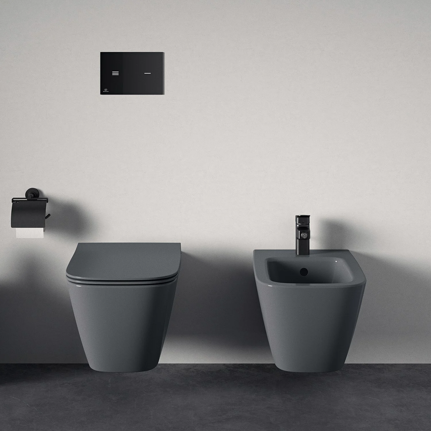 Szara toaleta i bidet obok siebie, Ideal Standard