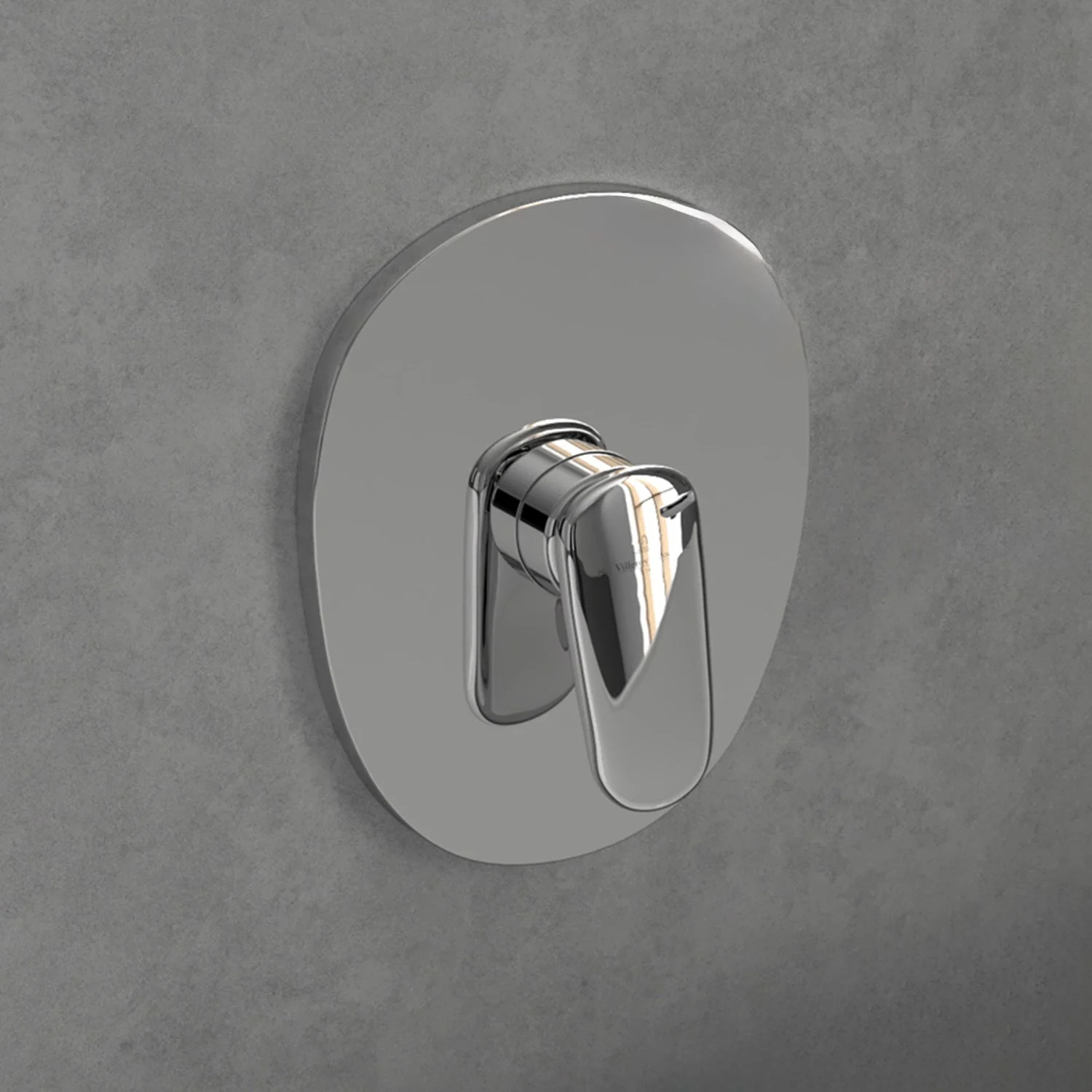 Chromowana armatura zamontowana na szarej ścianie, Villeroy & Boch