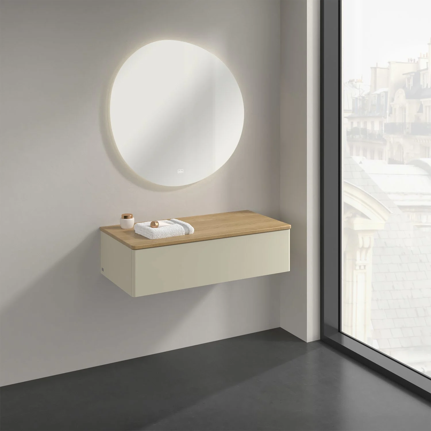 Kremowa umywalka z okrągłym lustrem w łazience, Villeroy & Boch