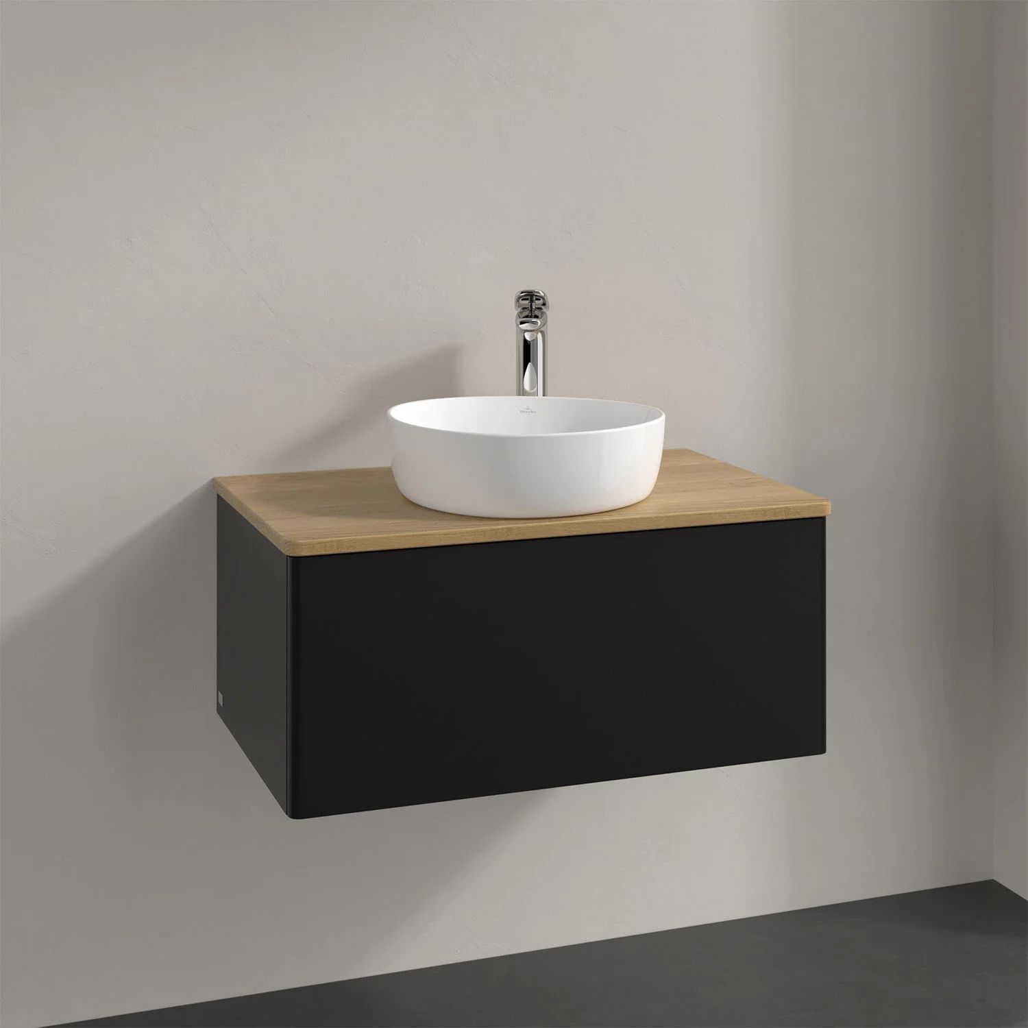 Umywalka z jasnym drewnem i czarną szafką, Villeroy & Boch