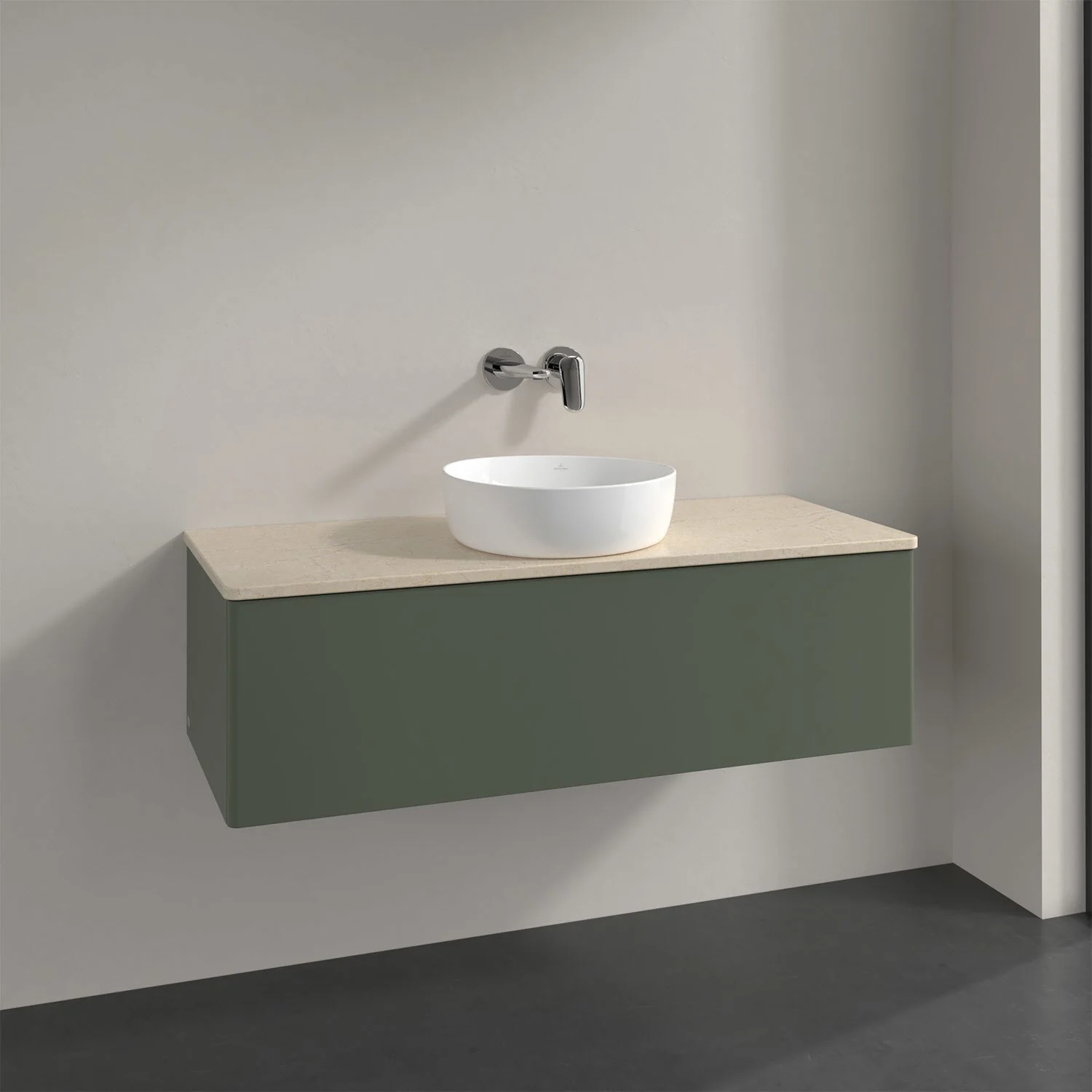 Biała umywalka na zielonej szafce w łazience, Villeroy & Boch