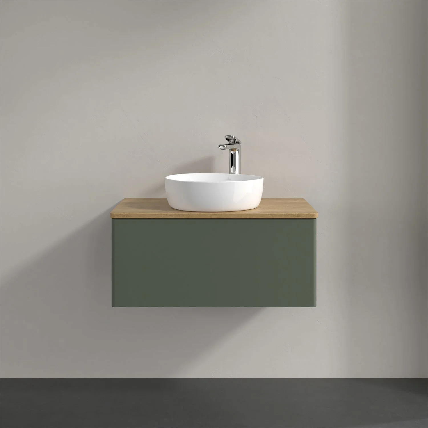 Umywalka z zieloną szafką i baterią, Villeroy & Boch
