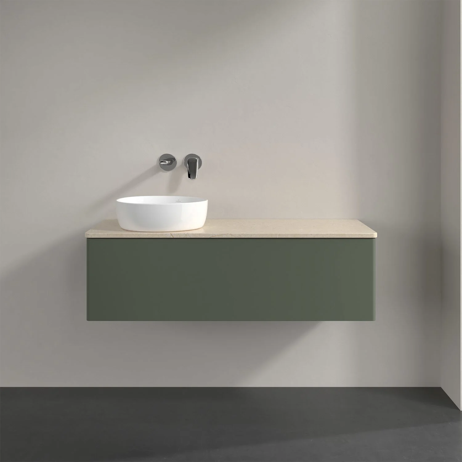 Biała umywalka na zielonej szafce w łazience, Villeroy & Boch