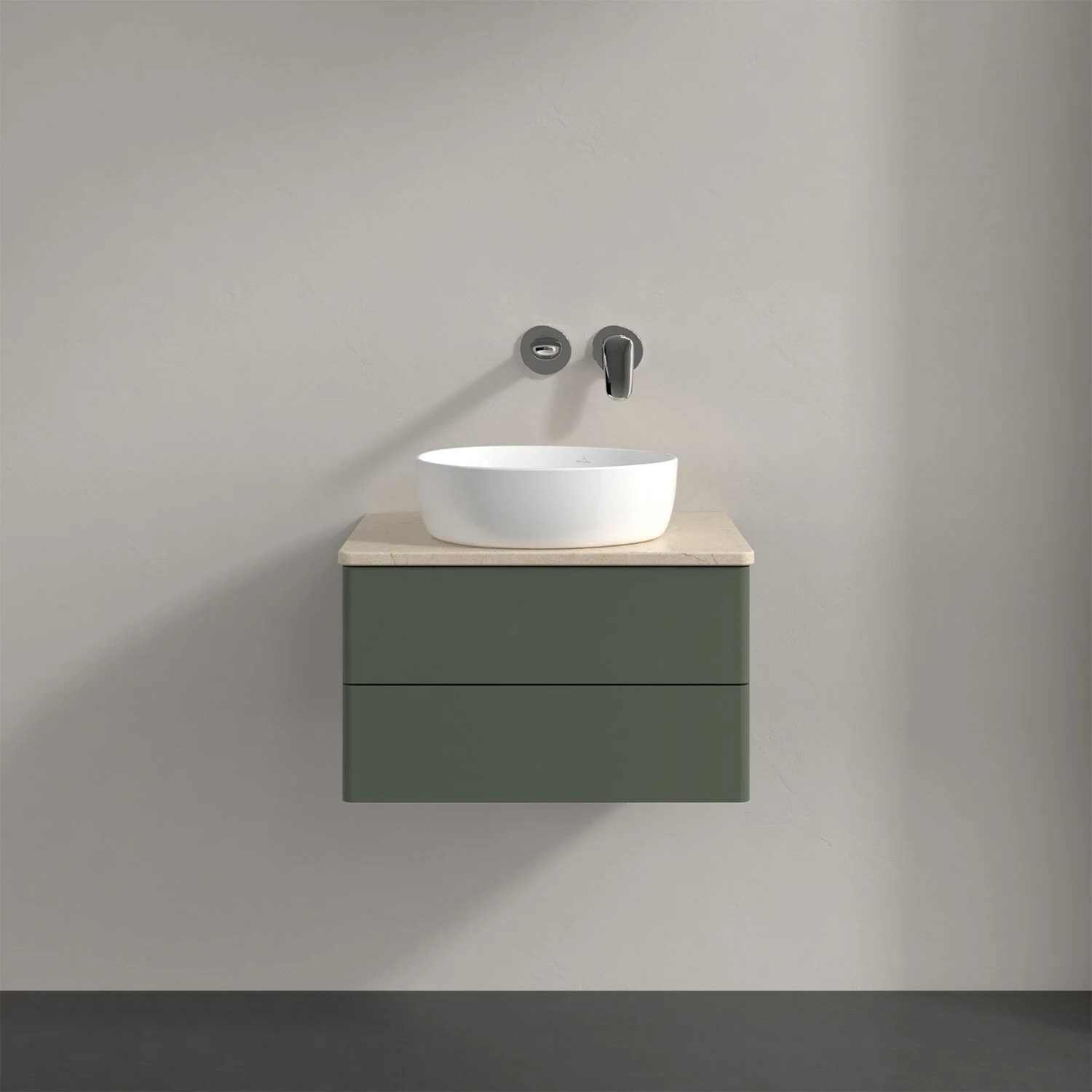 Biała umywalka na zielonej szafce w łazience, Villeroy & Boch