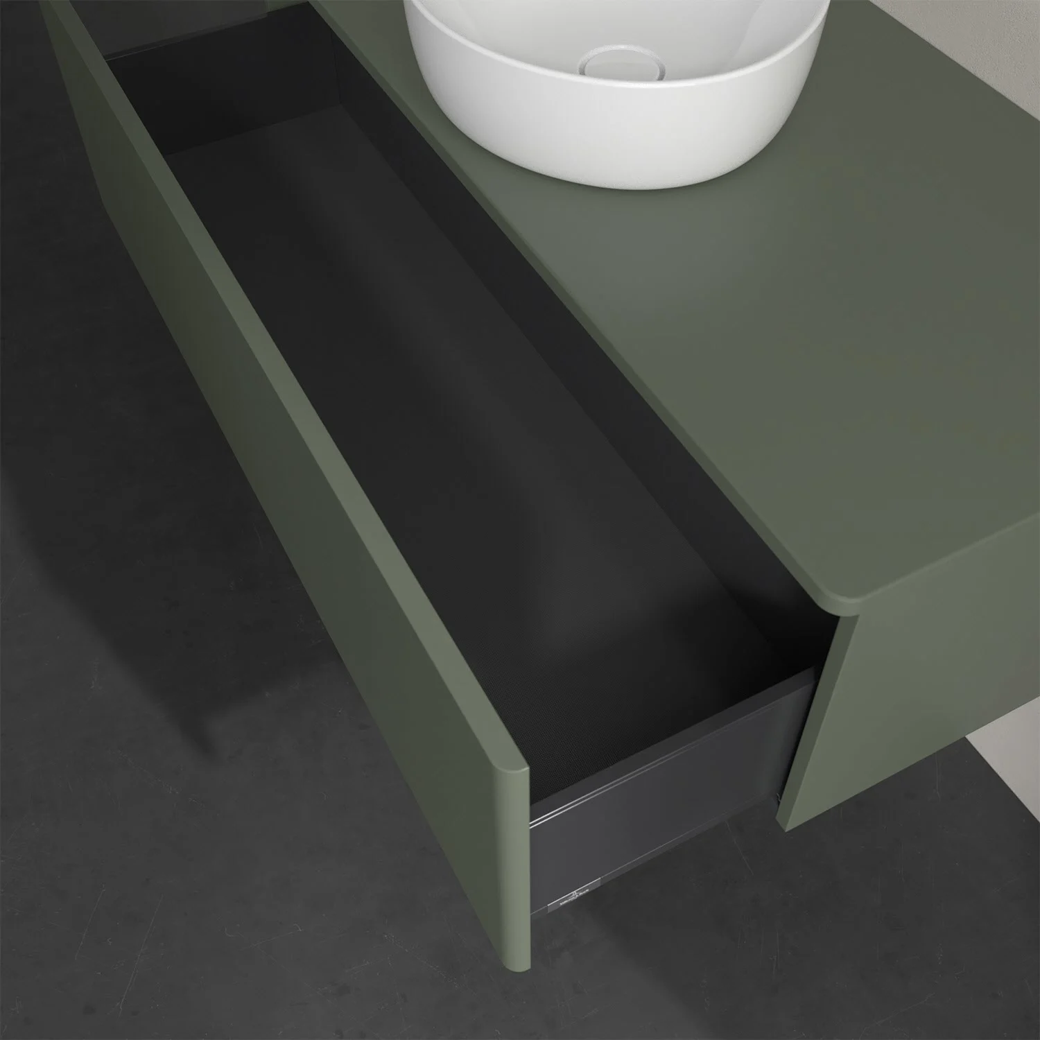 Otwarta szuflada pod zieloną umywalką, Villeroy & Boch